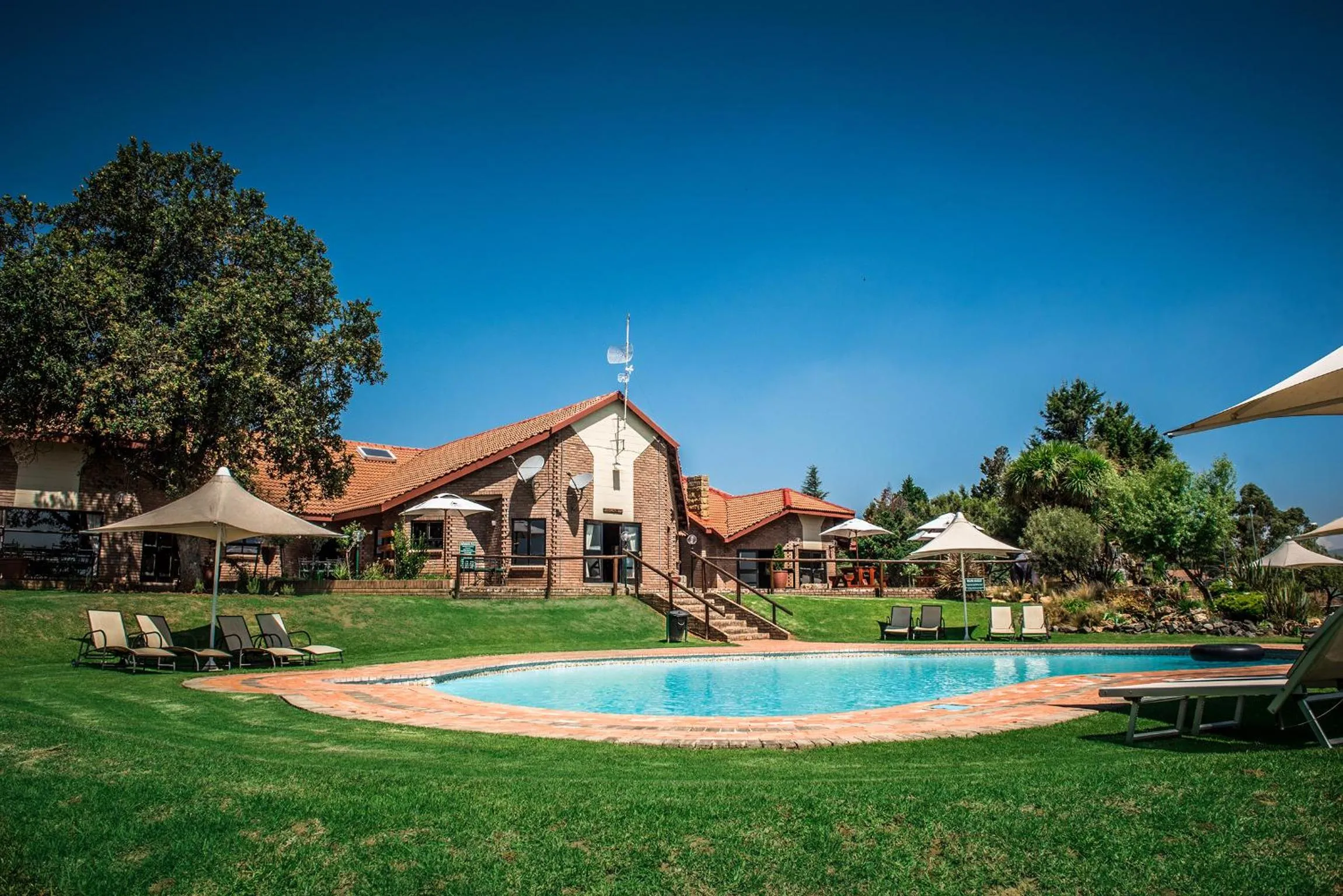 Property building in First Group Qwantani