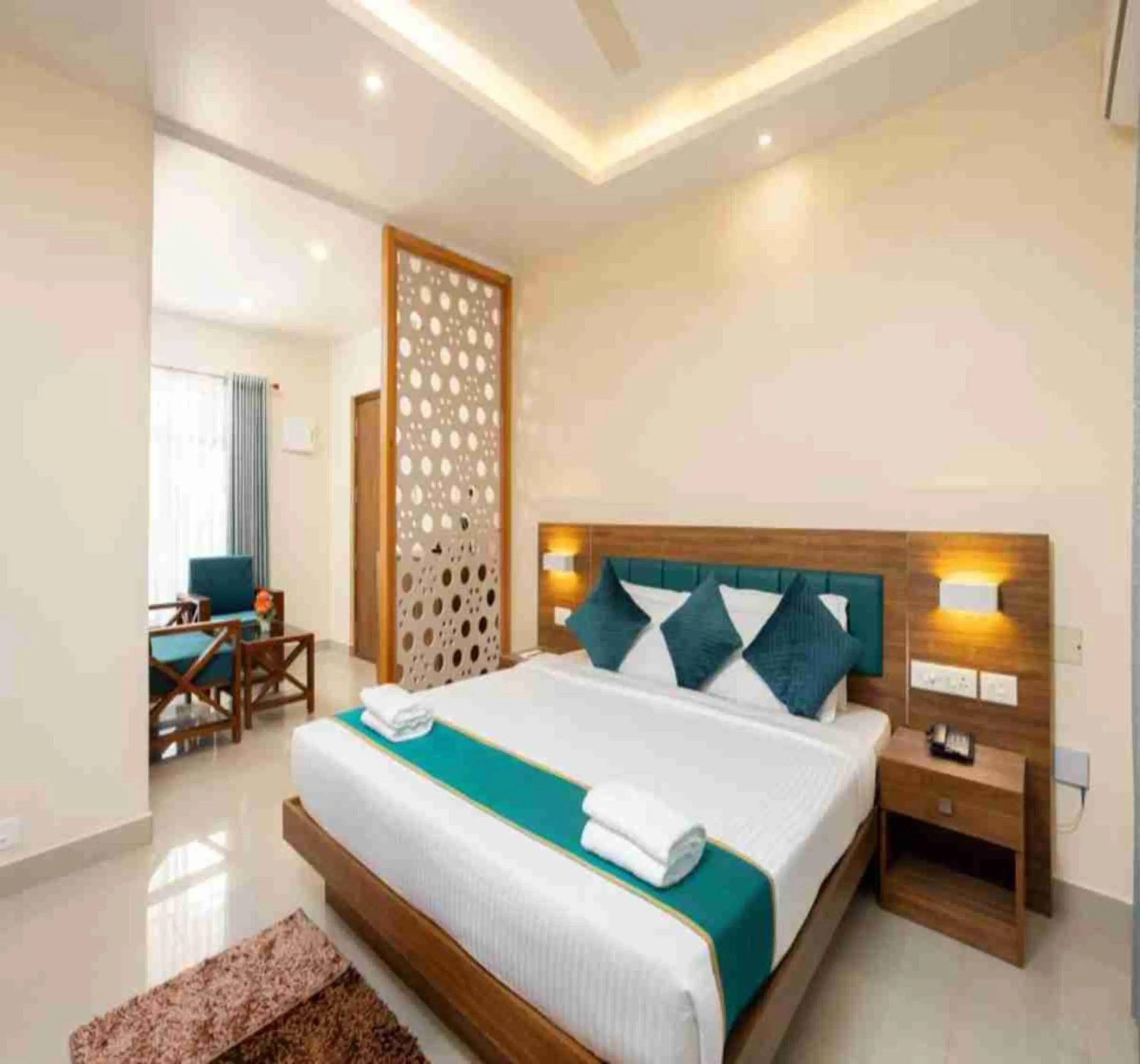 Bed in Le Serene Munnar Luxury Resorts & Spa