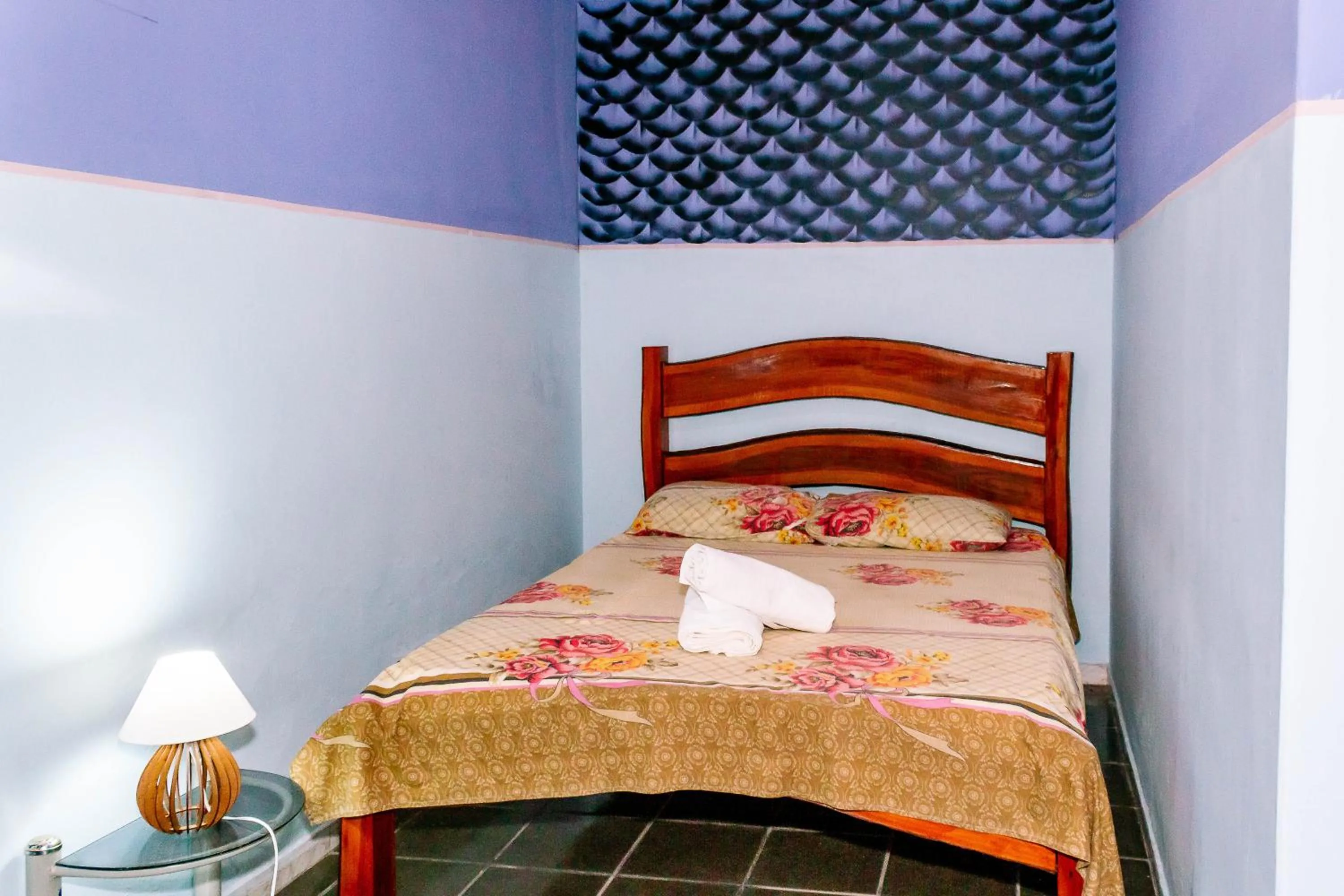 Bed in Pousada Cachoeira da Fumaça