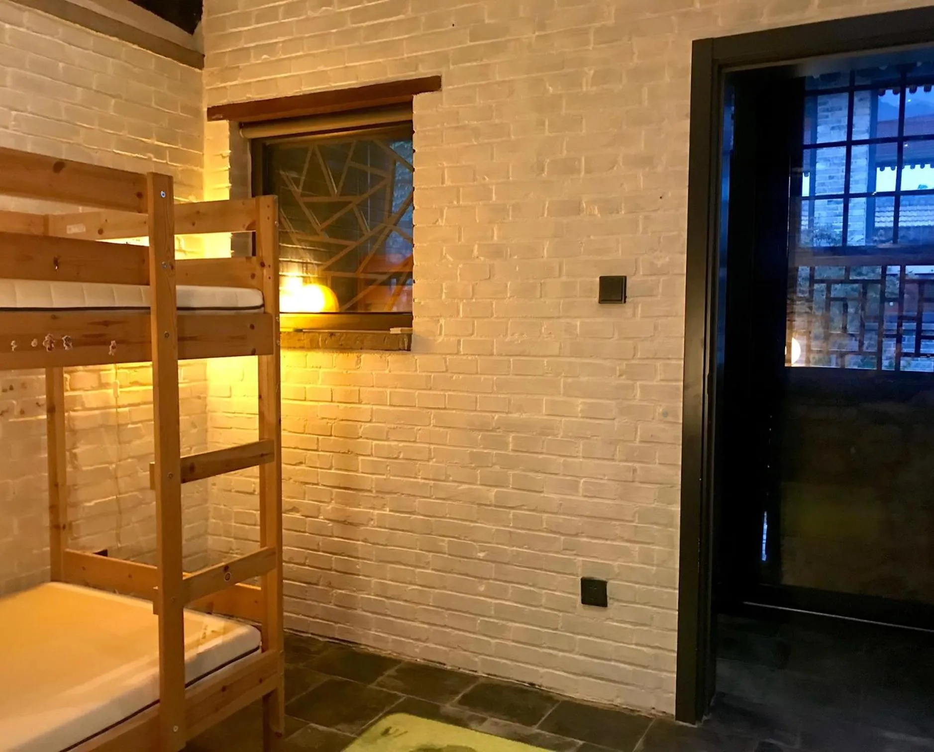 Bedroom in Brickyard Retreat at Mutianyu Great Wall Adjoin to Mutianyu Great Wall - Room with the View of Great Wall - Jacuzzi with the View of Great Wall - Vehicle Shuttle Service - International Catering - SPA& Nail Beauty Facilities