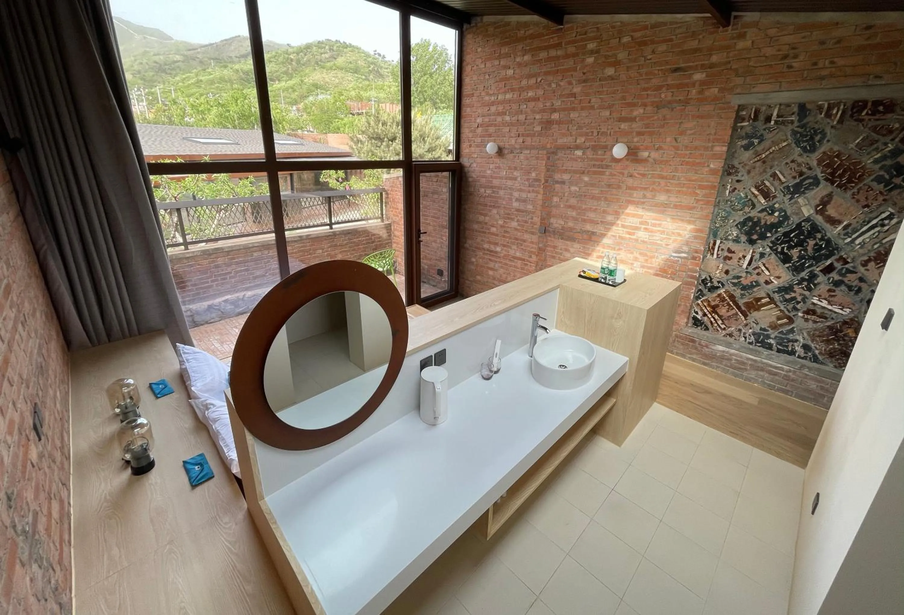 Photo of the whole room in Brickyard Retreat at Mutianyu Great Wall Adjoin to Mutianyu Great Wall - Room with the View of Great Wall - Jacuzzi with the View of Great Wall - Vehicle Shuttle Service - International Catering - SPA& Nail Beauty Facilities