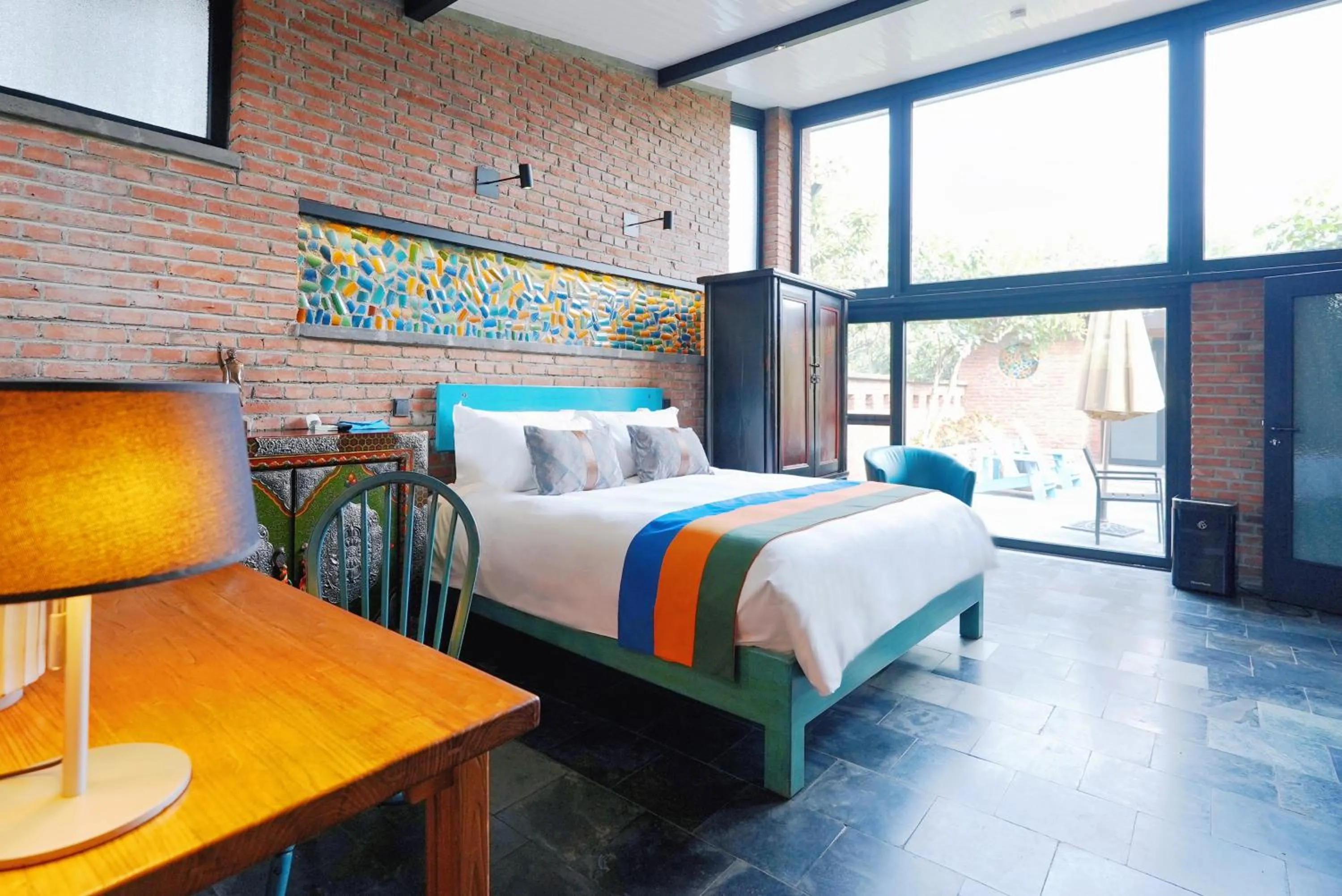 Photo of the whole room, Bed in Brickyard Retreat at Mutianyu Great Wall Adjoin to Mutianyu Great Wall - Room with the View of Great Wall - Jacuzzi with the View of Great Wall - Vehicle Shuttle Service - International Catering - SPA& Nail Beauty Facilities