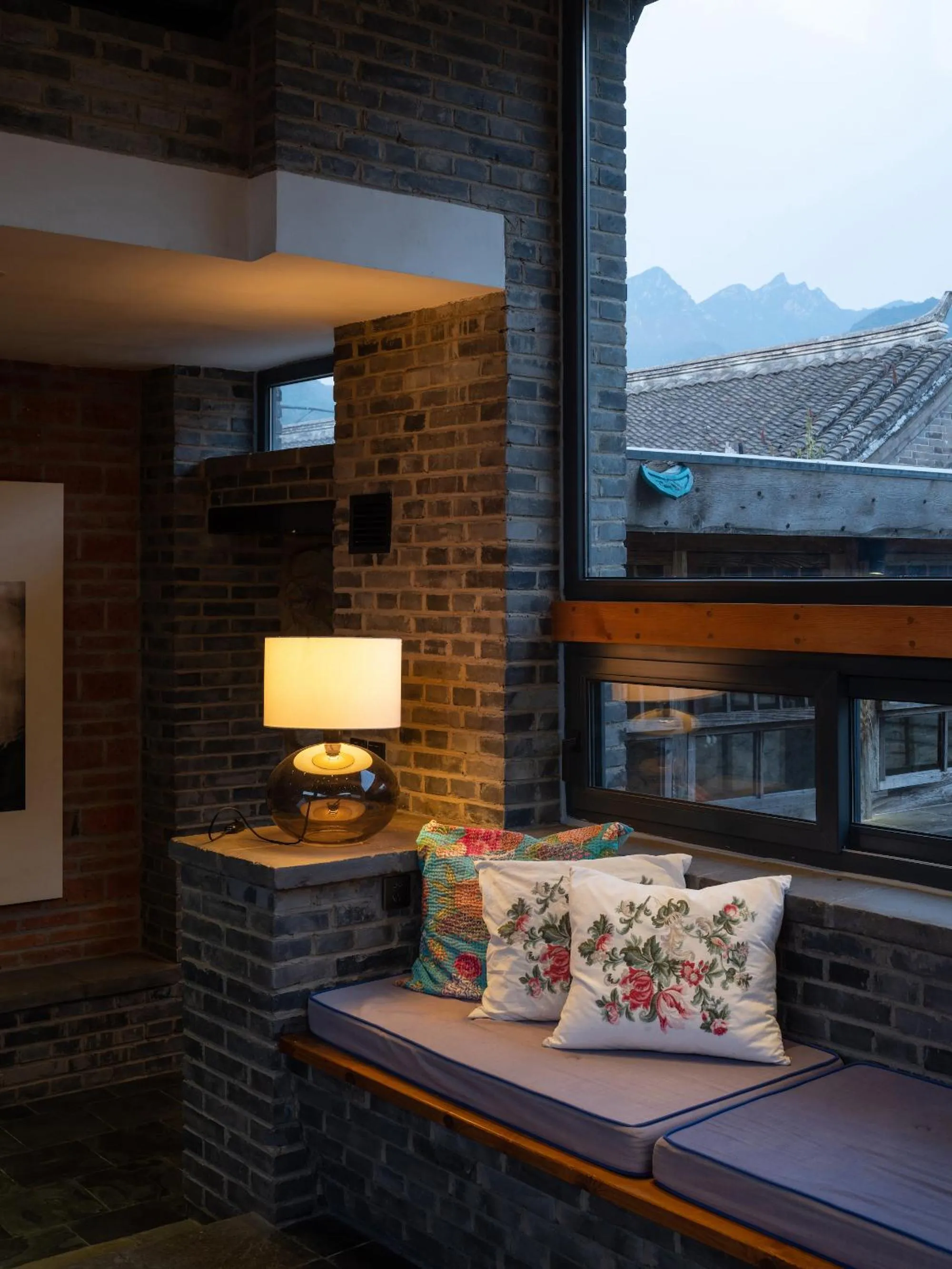 Seating area in Brickyard Retreat at Mutianyu Great Wall Adjoin to Mutianyu Great Wall - Room with the View of Great Wall - Jacuzzi with the View of Great Wall - Vehicle Shuttle Service - International Catering - SPA& Nail Beauty Facilities