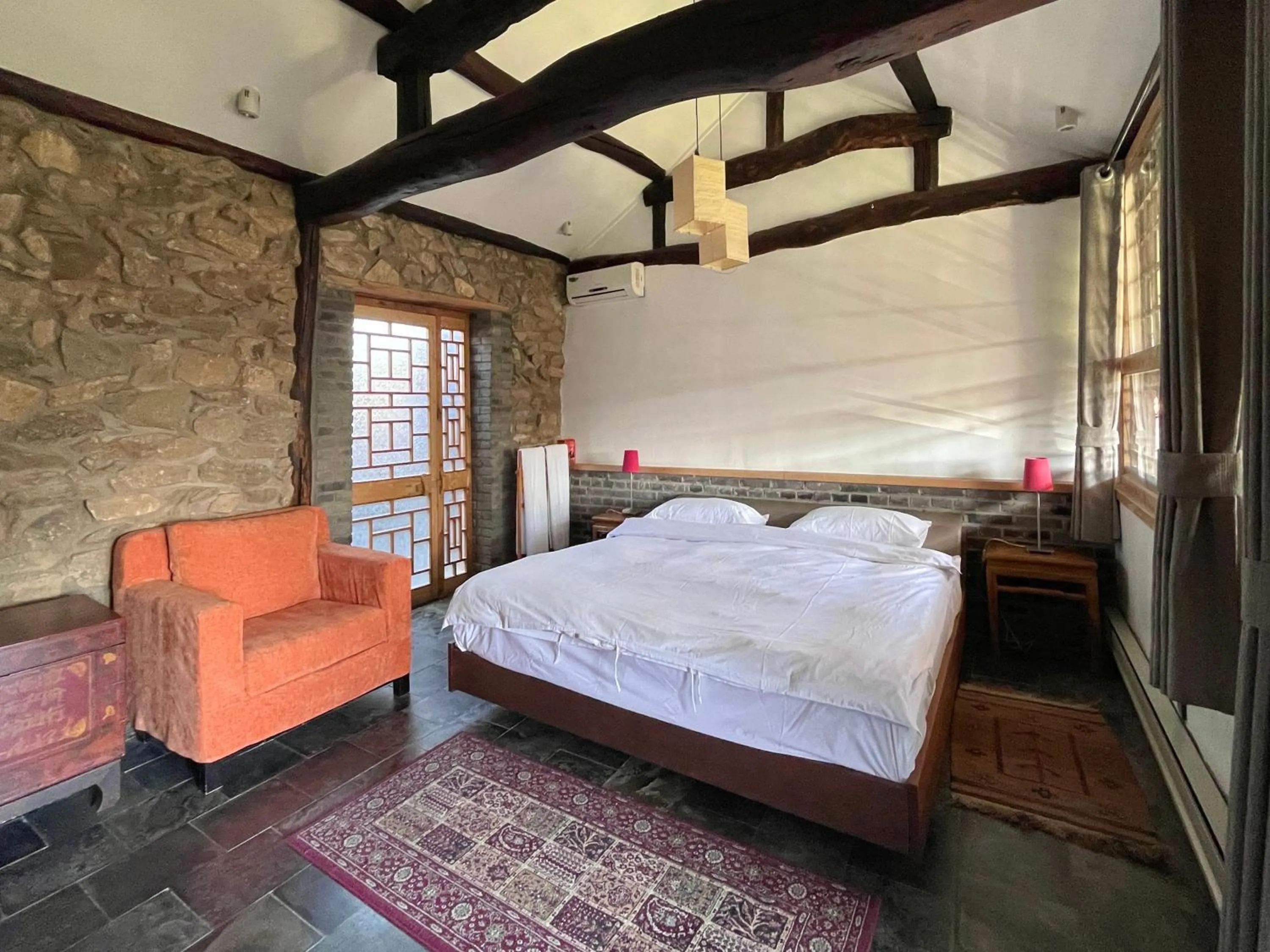 Bedroom, Bed in Brickyard Retreat at Mutianyu Great Wall Adjoin to Mutianyu Great Wall - Room with the View of Great Wall - Jacuzzi with the View of Great Wall - Vehicle Shuttle Service - International Catering - SPA& Nail Beauty Facilities