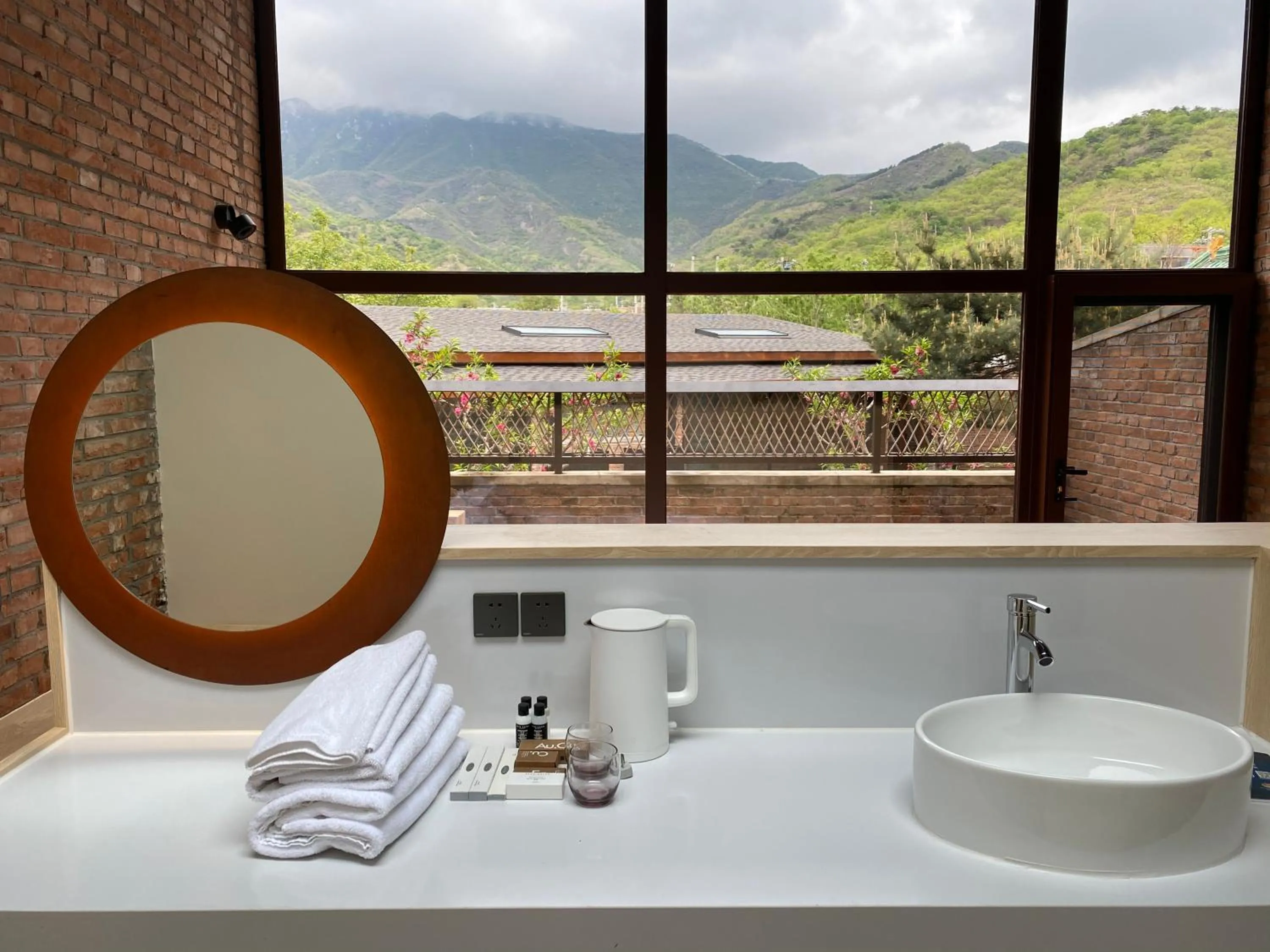 Bathroom in Brickyard Retreat at Mutianyu Great Wall Adjoin to Mutianyu Great Wall - Room with the View of Great Wall - Jacuzzi with the View of Great Wall - Vehicle Shuttle Service - International Catering - SPA& Nail Beauty Facilities