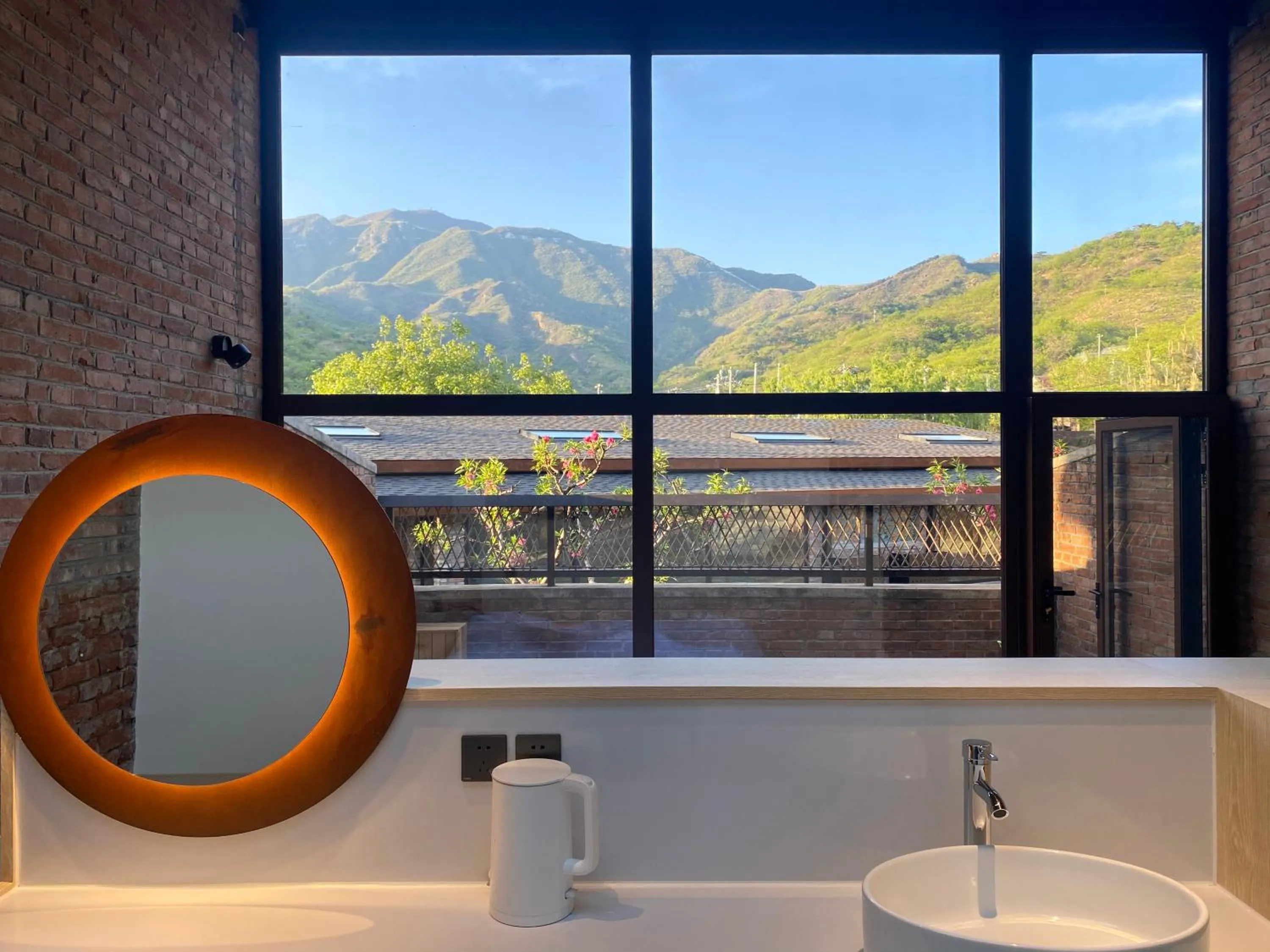 Mountain view in Brickyard Retreat at Mutianyu Great Wall Adjoin to Mutianyu Great Wall - Room with the View of Great Wall - Jacuzzi with the View of Great Wall - Vehicle Shuttle Service - International Catering - SPA& Nail Beauty Facilities