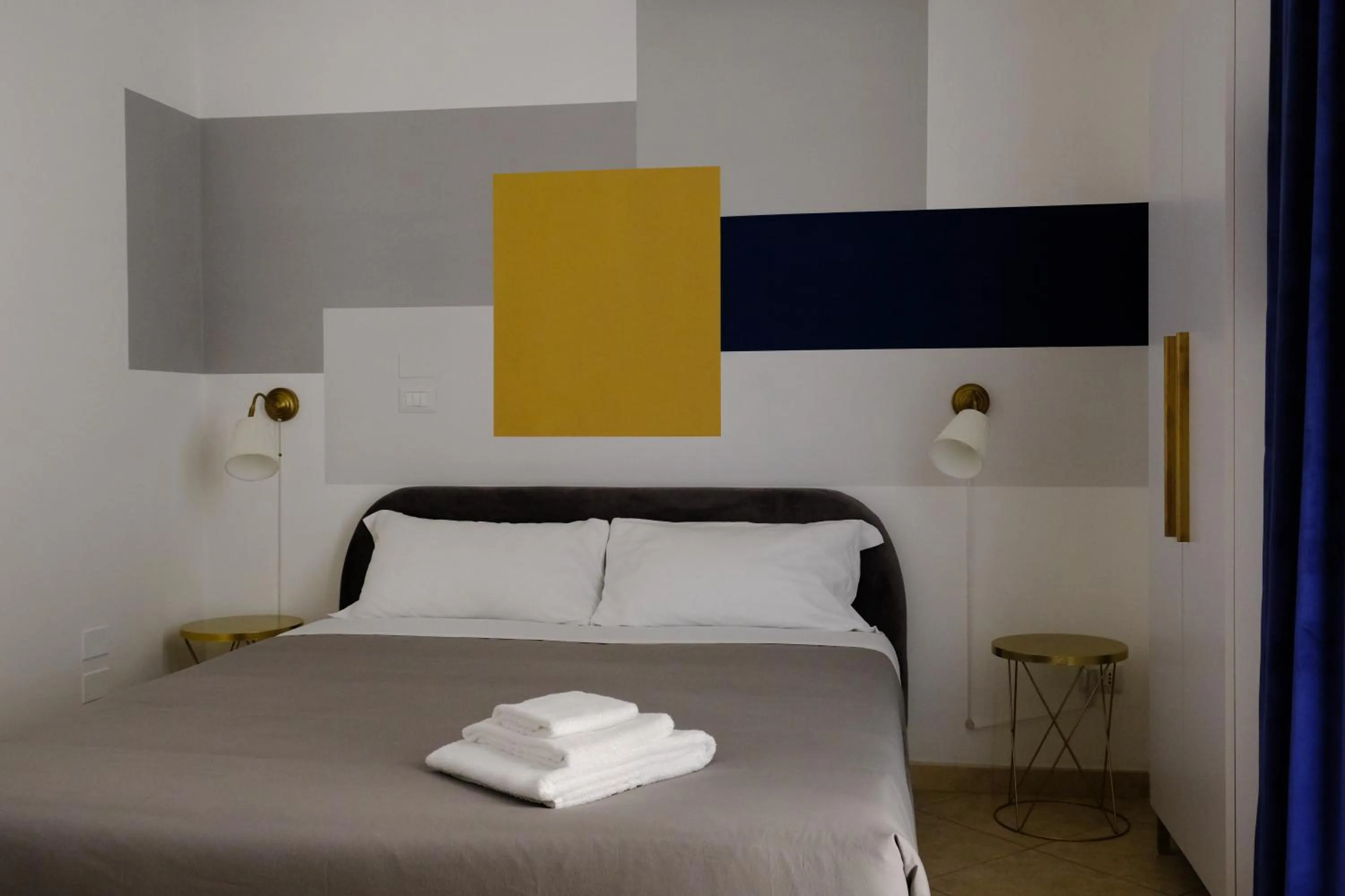 Bed in MATTEOTTI ROOMS