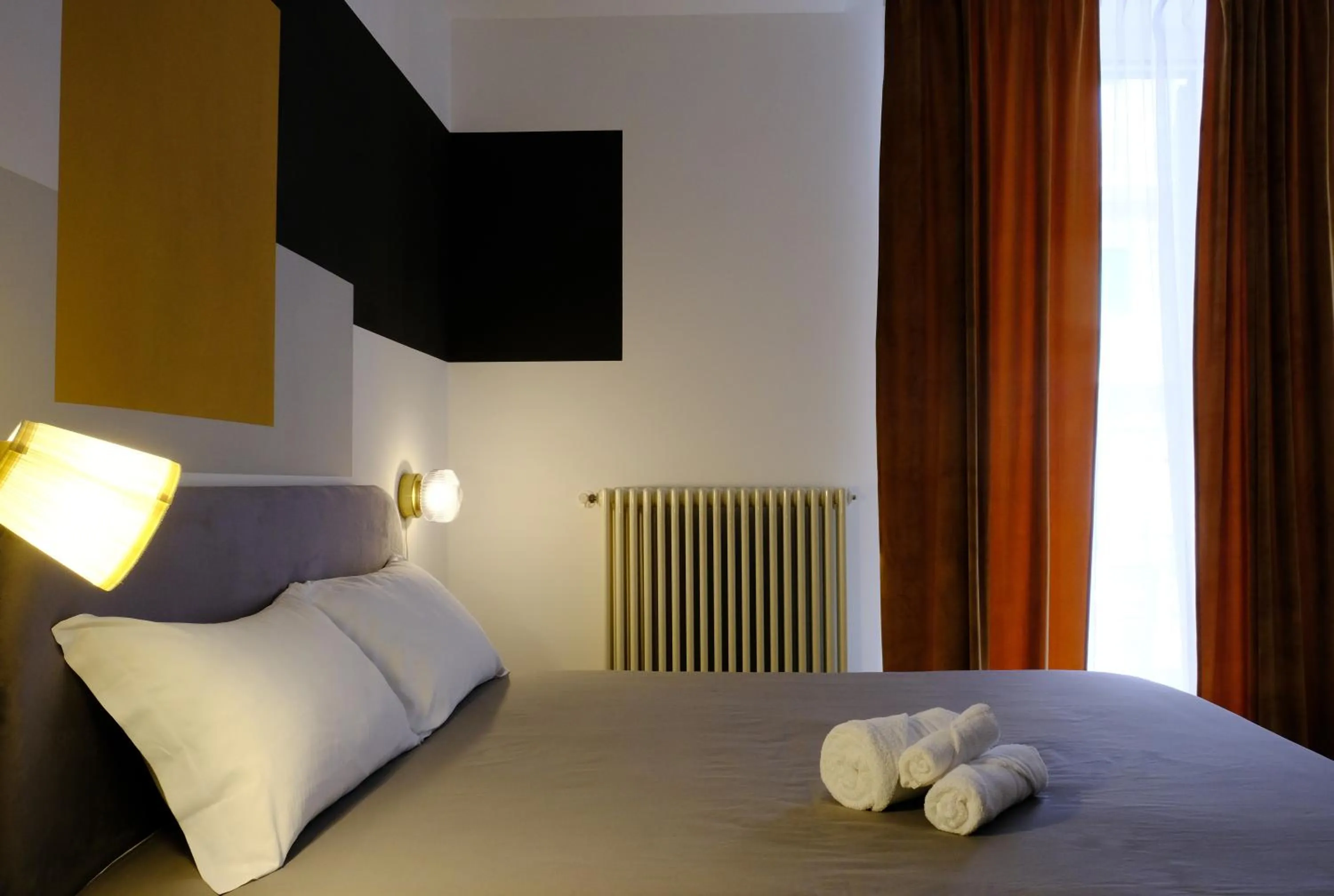 Photo of the whole room, Bed in MATTEOTTI ROOMS