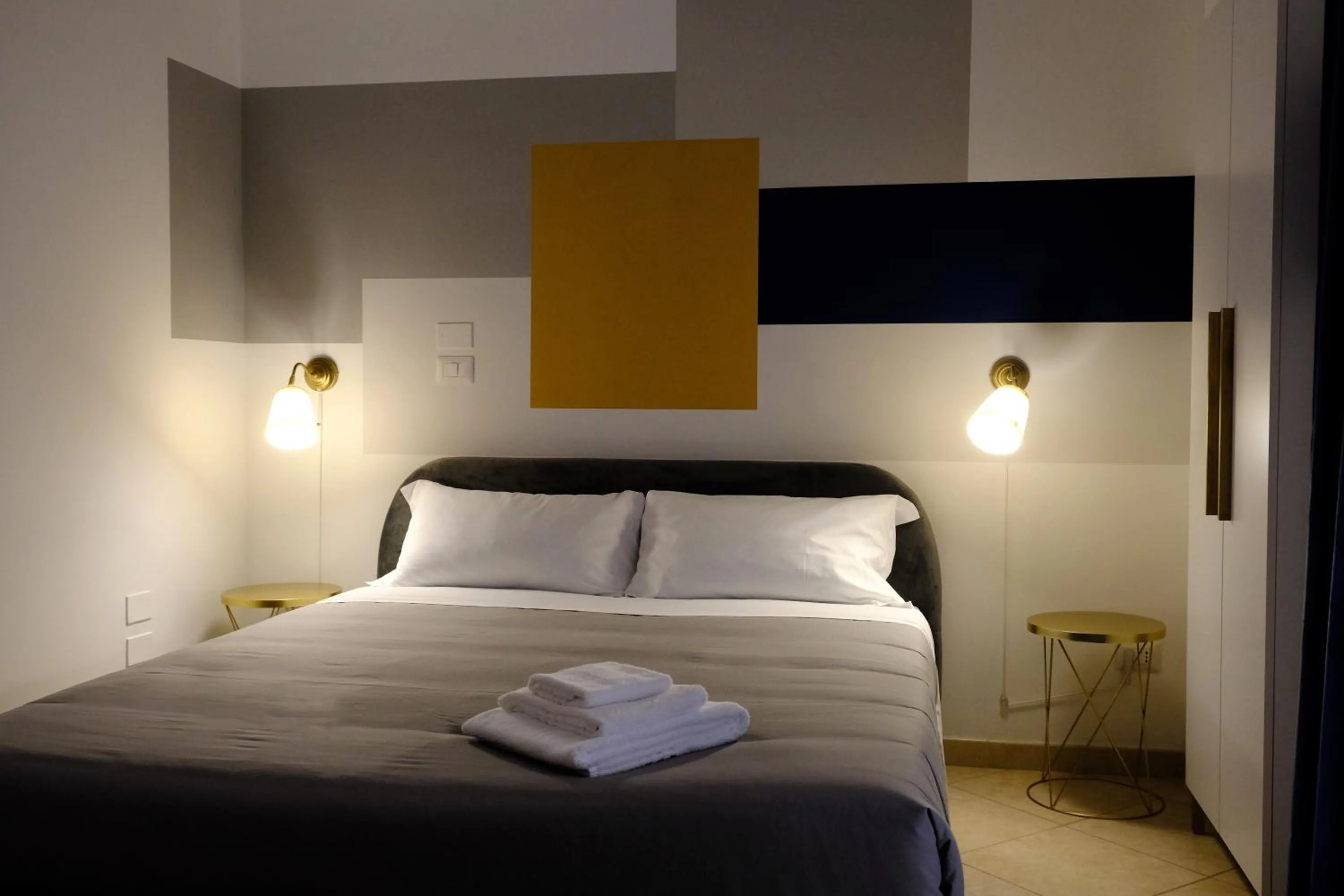 Bed in MATTEOTTI ROOMS