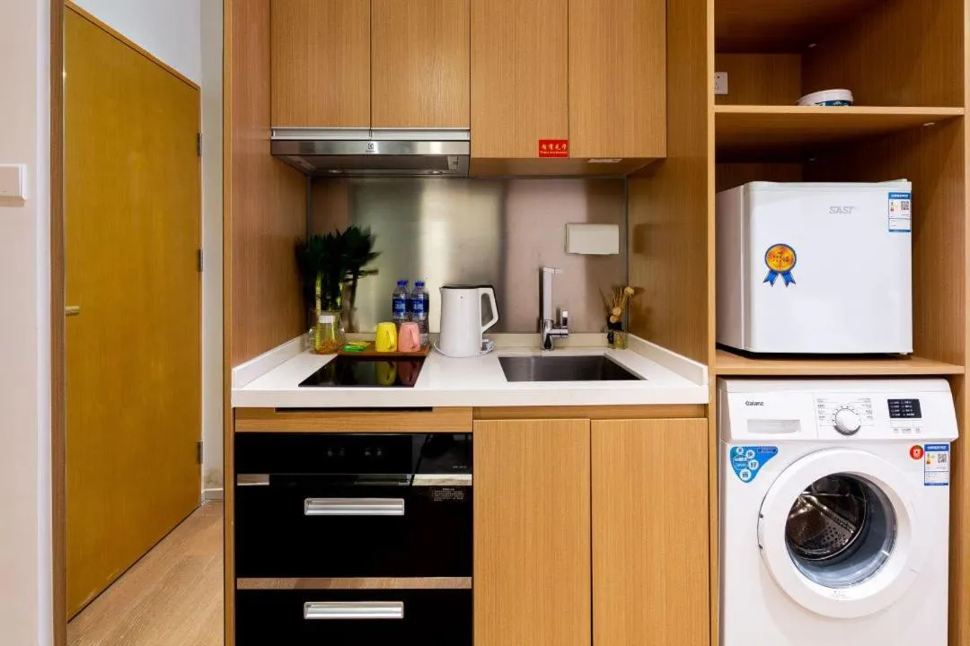 Kitchen or kitchenette in Guangzhou YuXiang Apartment - Guangzhou Pazhou International Convention and Exhibition Center