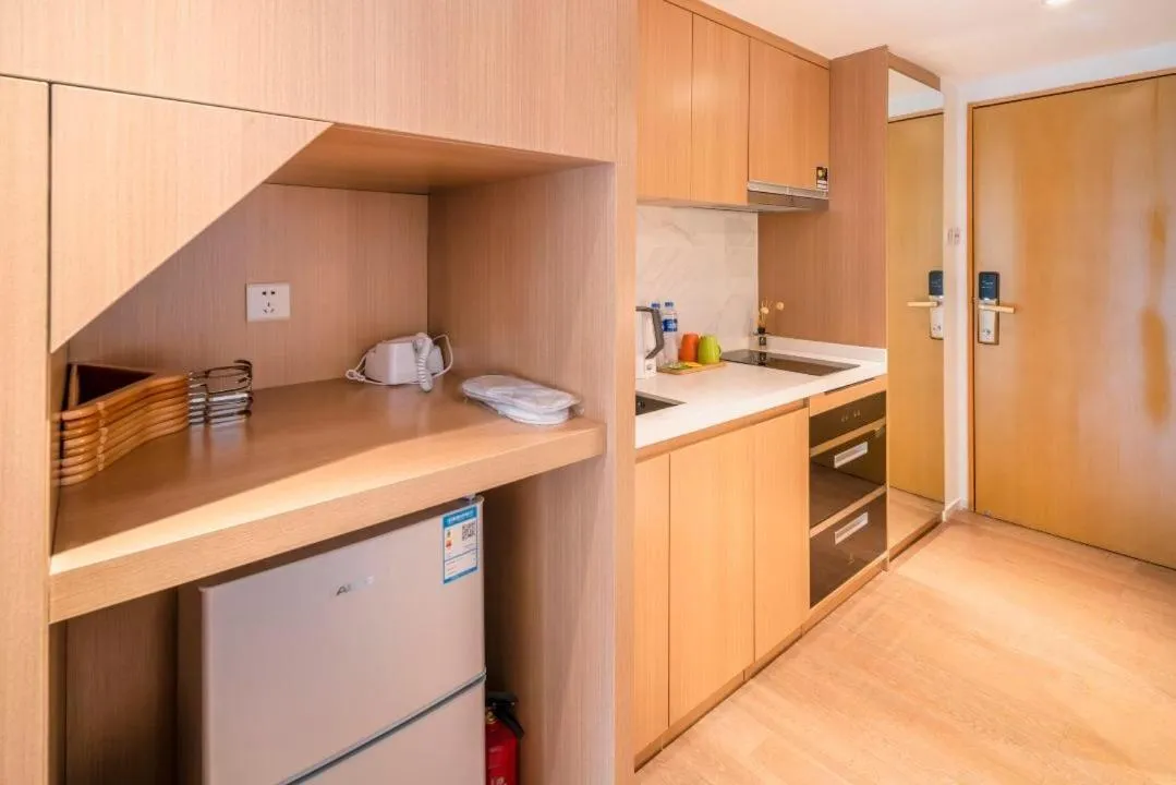 Kitchen or kitchenette in Guangzhou YuXiang Apartment - Guangzhou Pazhou International Convention and Exhibition Center