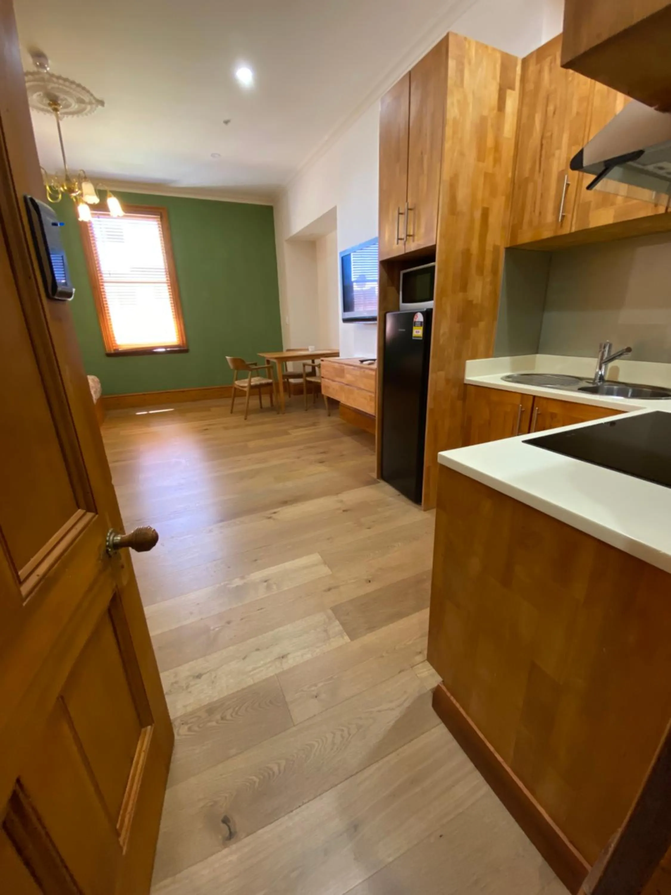 Kitchen or kitchenette in RIALTO SUITES Fremantle