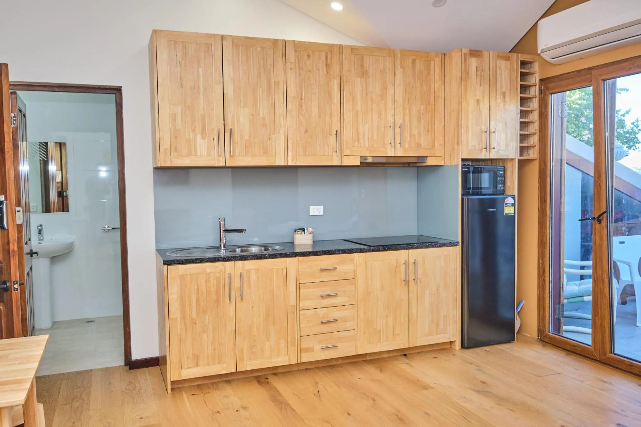 Kitchen or kitchenette in RIALTO SUITES Fremantle