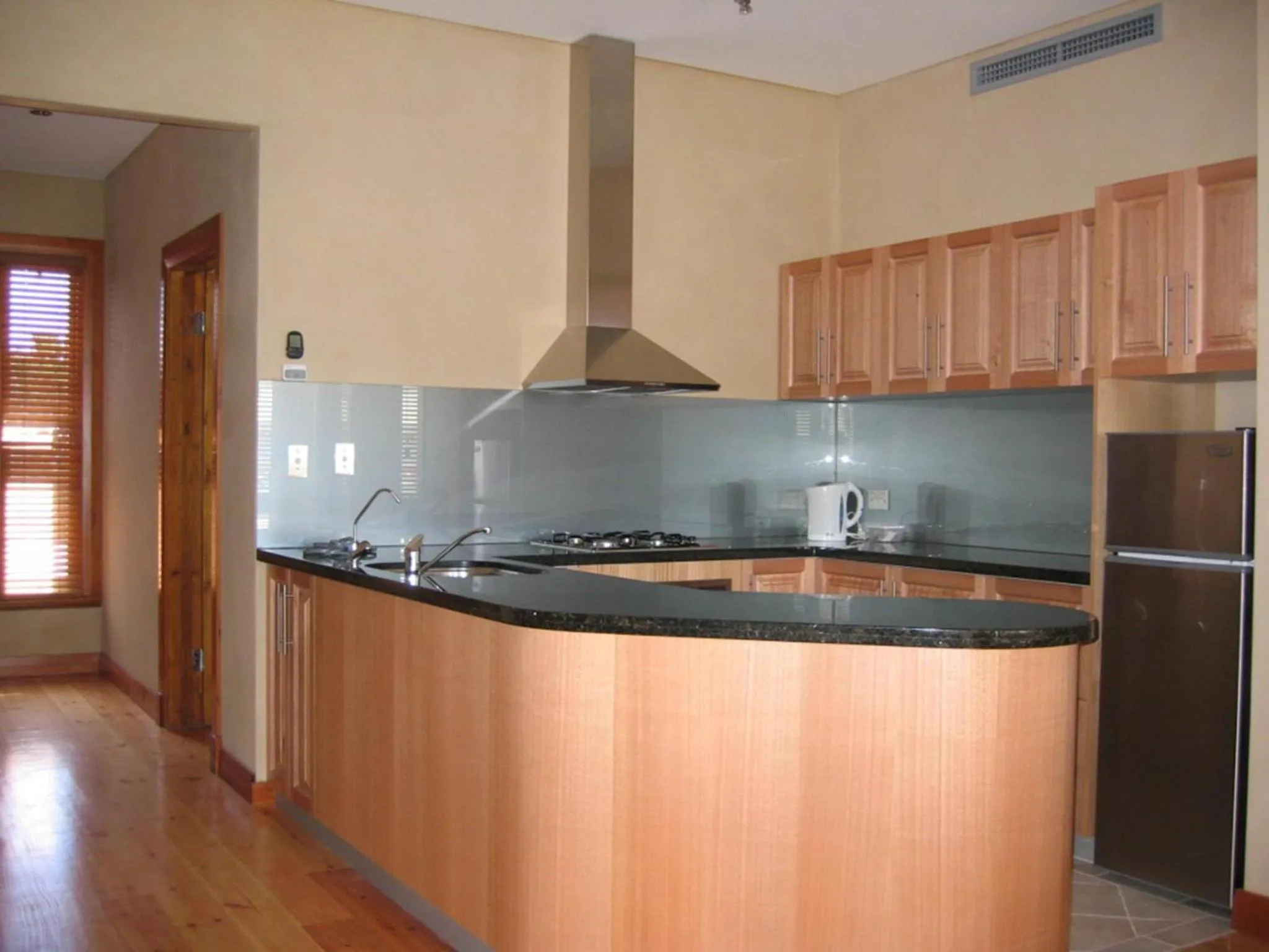 Kitchen or kitchenette in RIALTO SUITES Fremantle