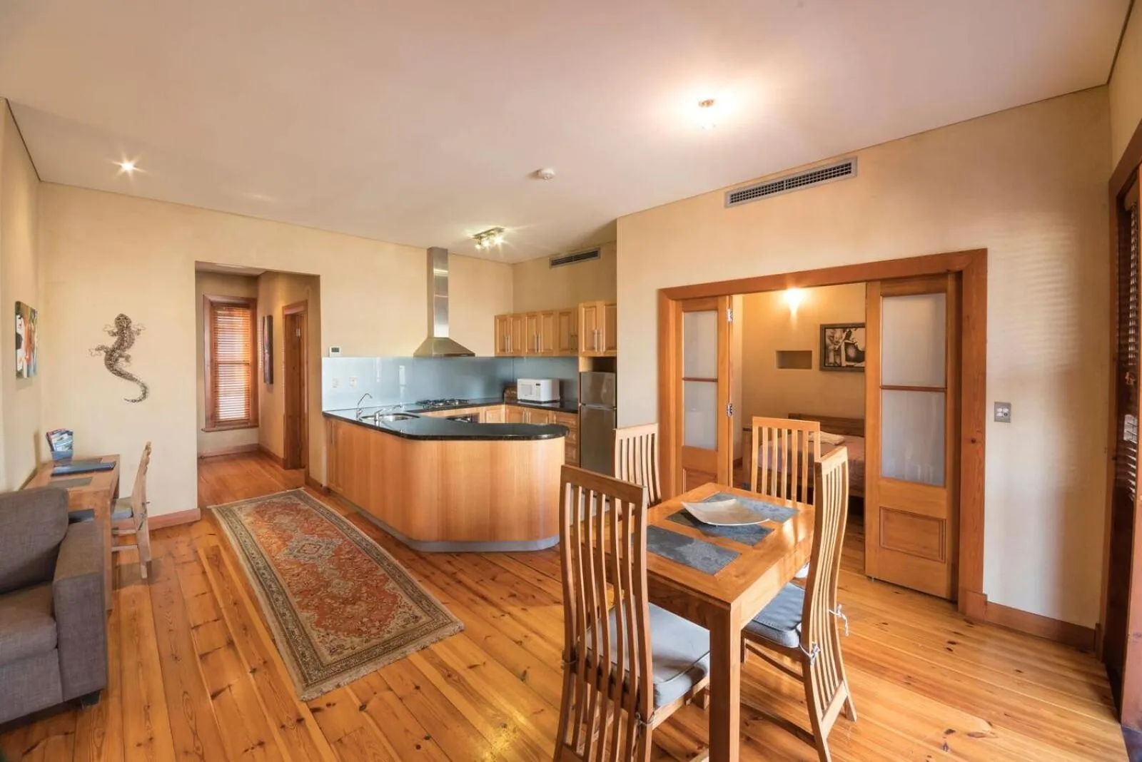 Kitchen or kitchenette in RIALTO SUITES Fremantle