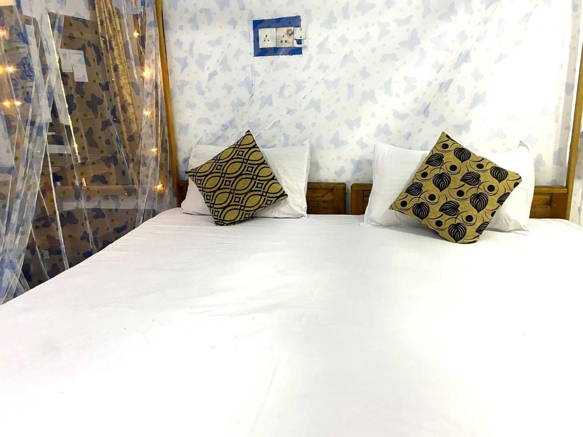 Bed in Star Rest Beach Hotel