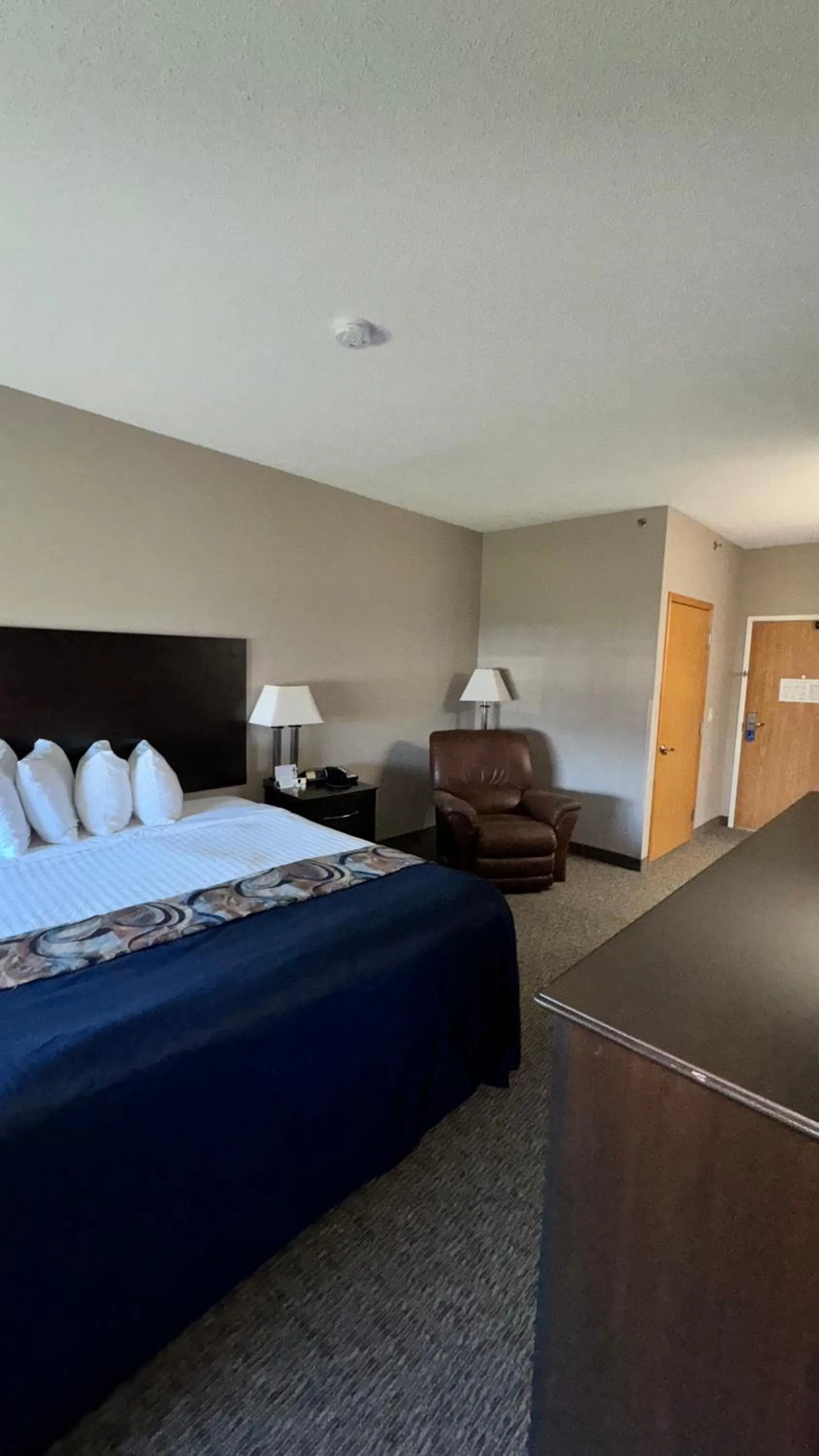 Bed in Garner INN & Suites