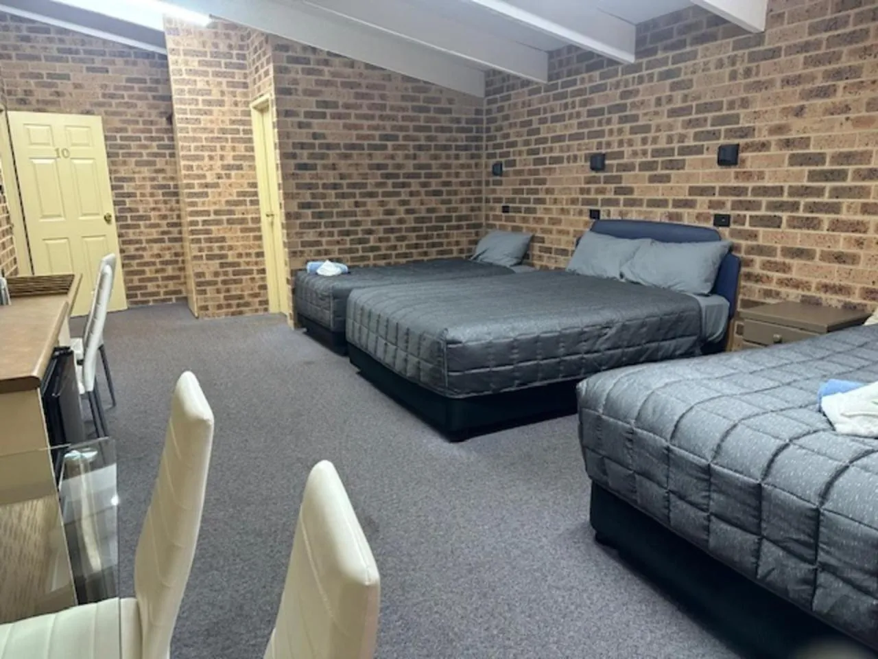 Bed in Clock Tower Motor Inn