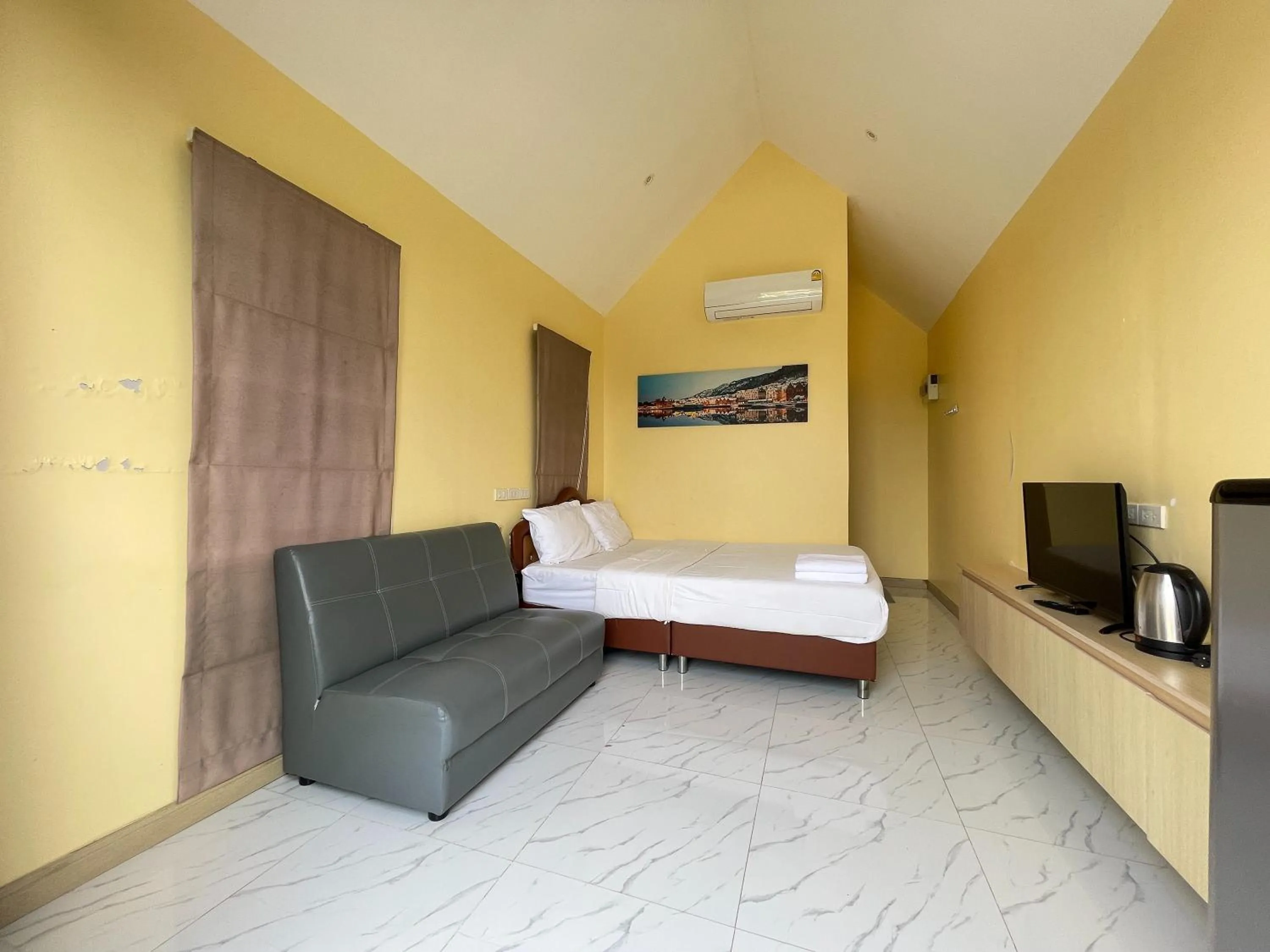 Seating area, Bed in Oh Taley Resort