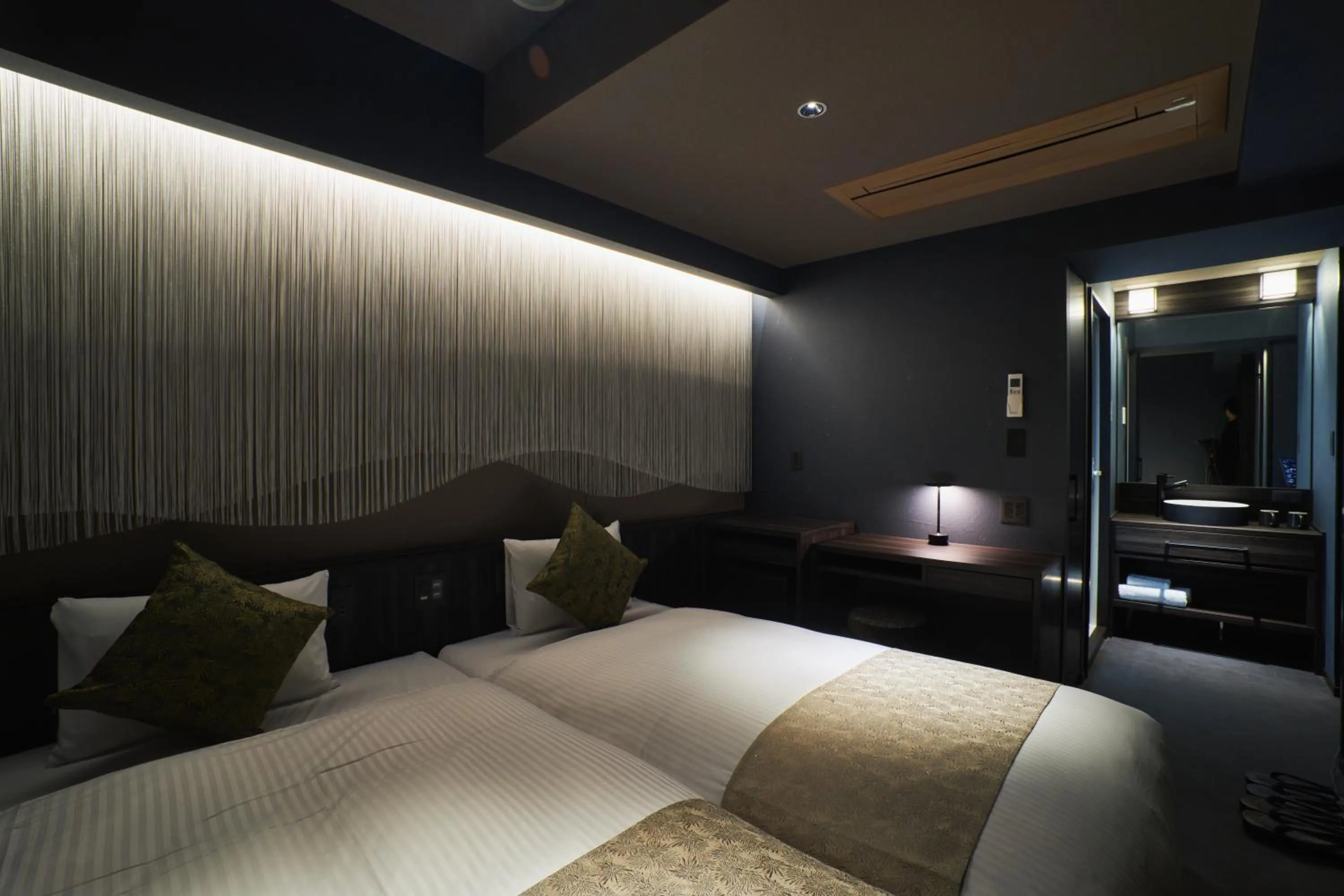 Bed in SAKE Bar Hotel Asakusa