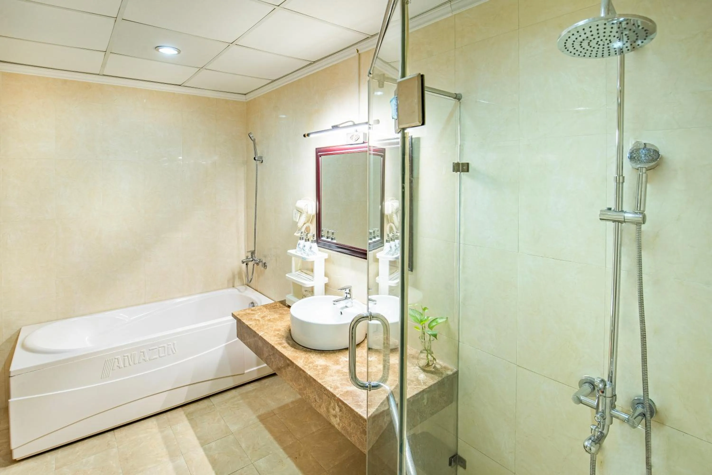 Shower in MAY PLAZA HOTEL