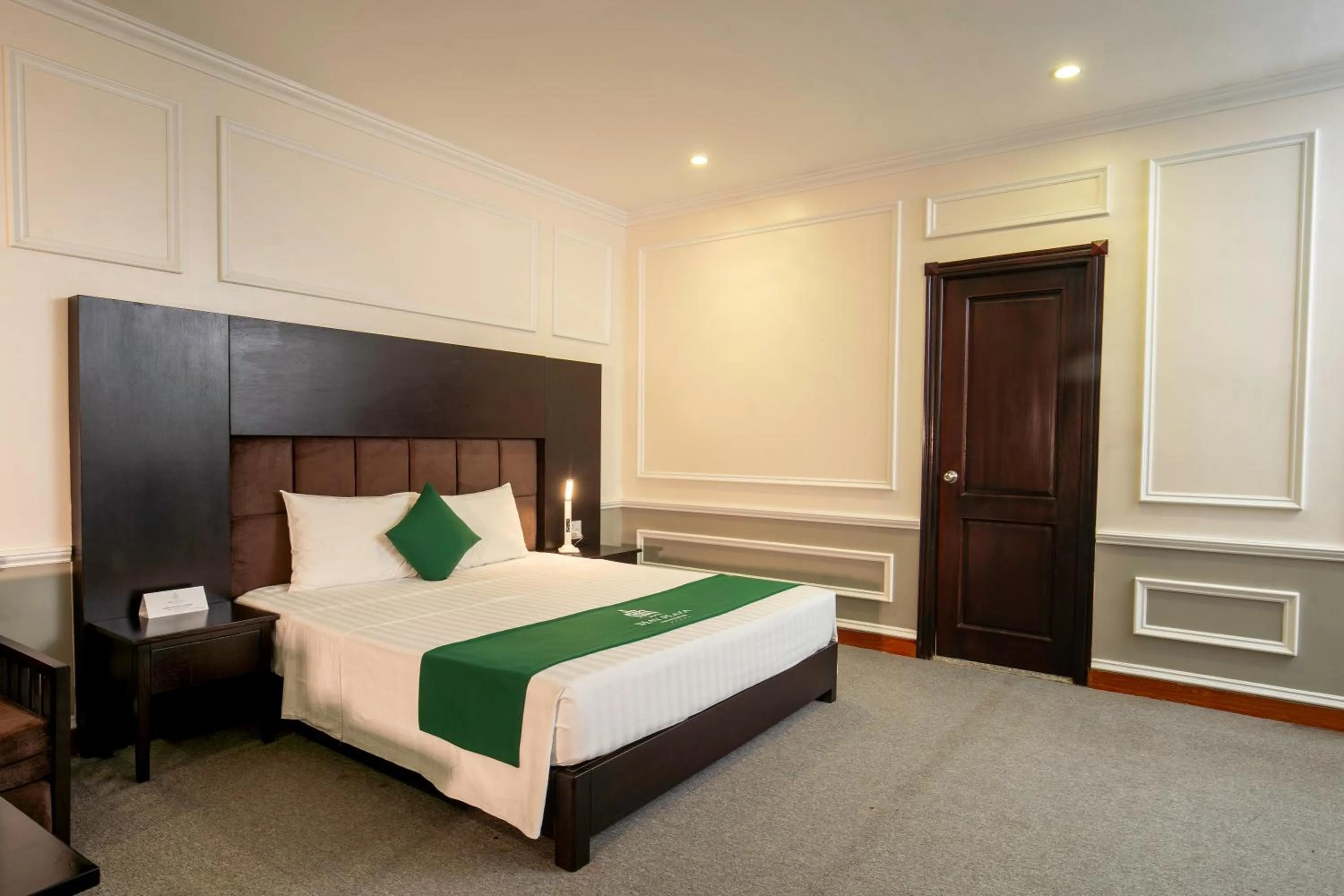 Bed in MAY PLAZA HOTEL