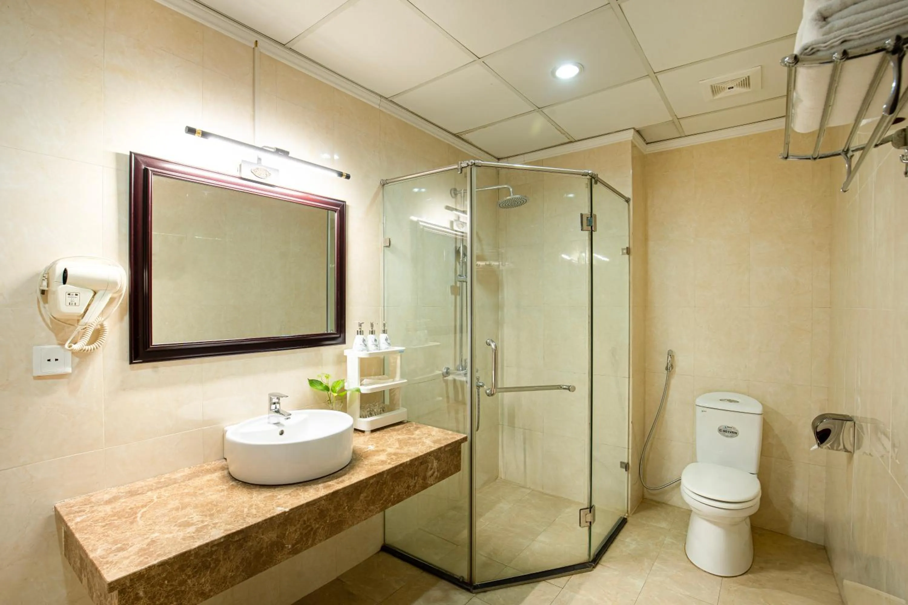 Shower in MAY PLAZA HOTEL