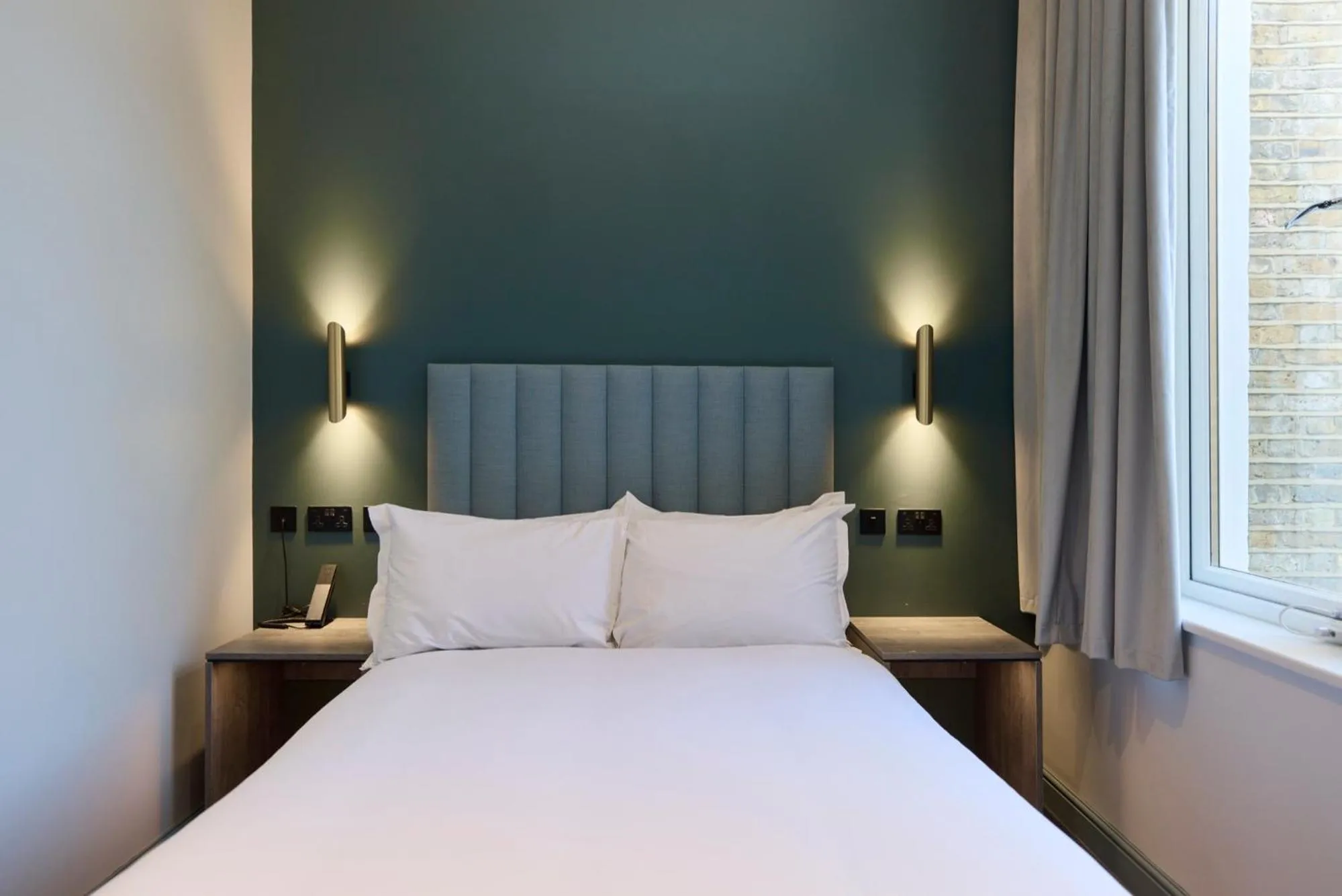 Bed in The Edwin Hotel