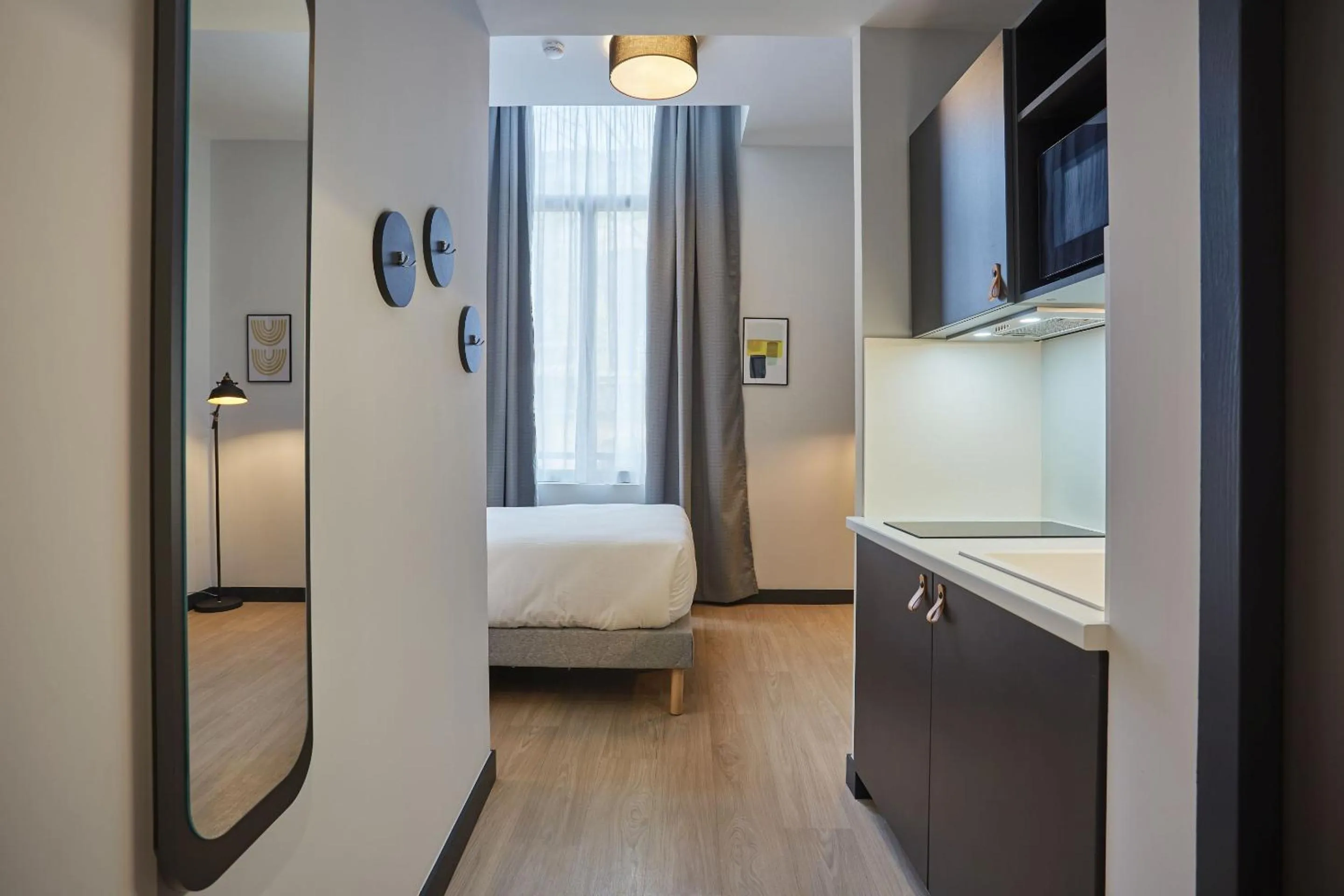 Bedroom, Bed in Appart'hôtel Odalys City - Nîmes Arènes - Palais des Congrès