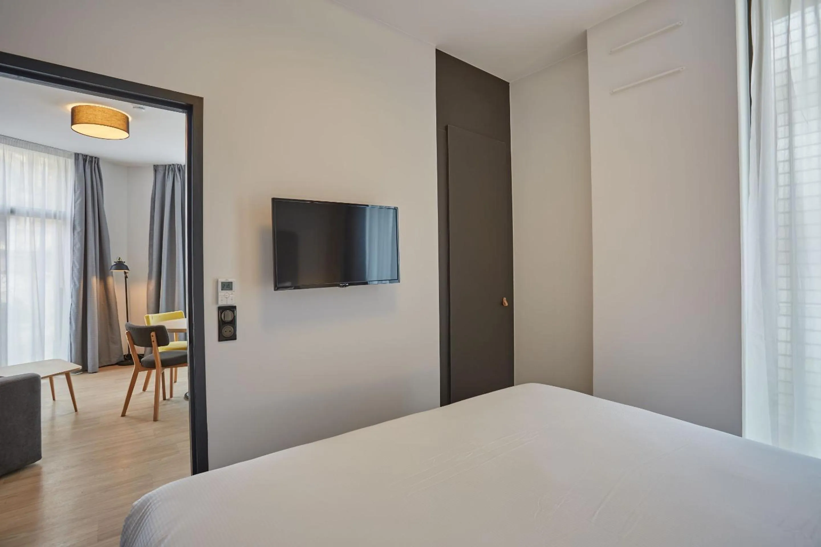 Bedroom, Bed in Appart'hôtel Odalys City - Nîmes Arènes - Palais des Congrès