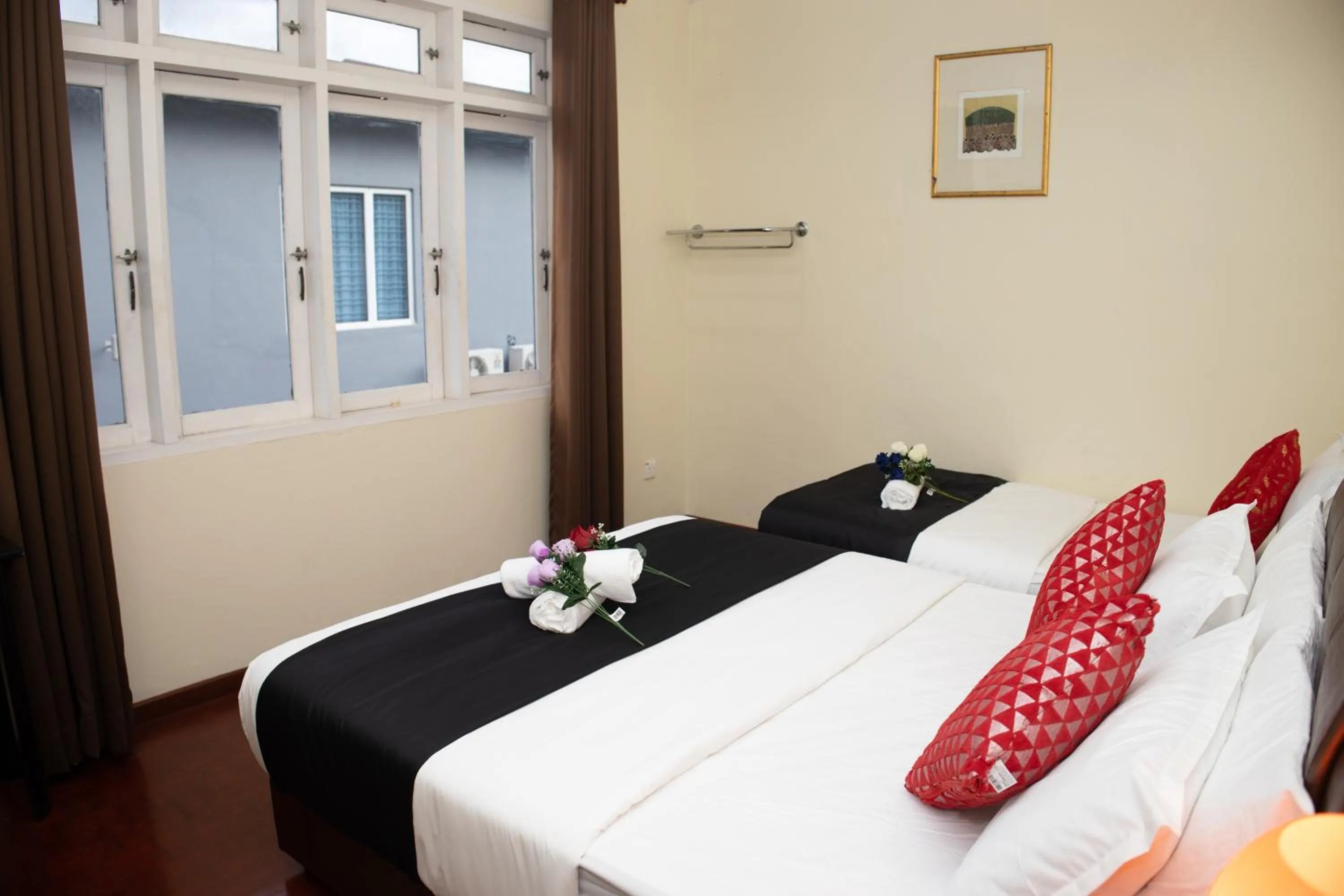 Bed in Sweet Inn Guest House