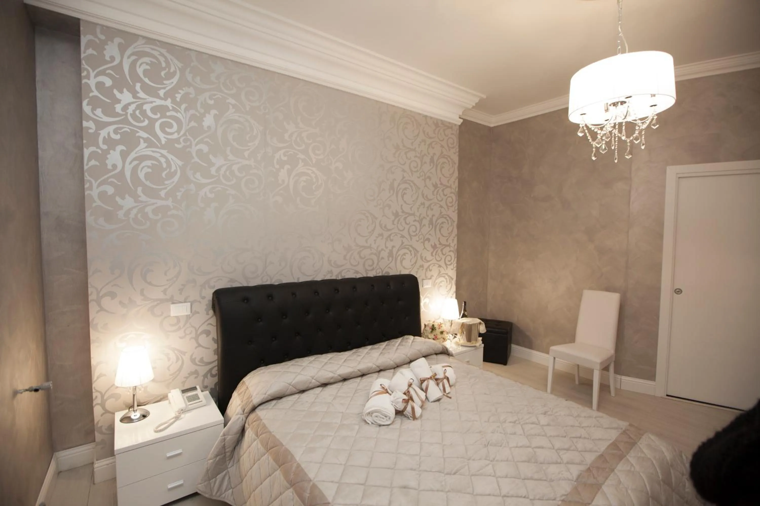 Bed in La Baita Del Re Resort