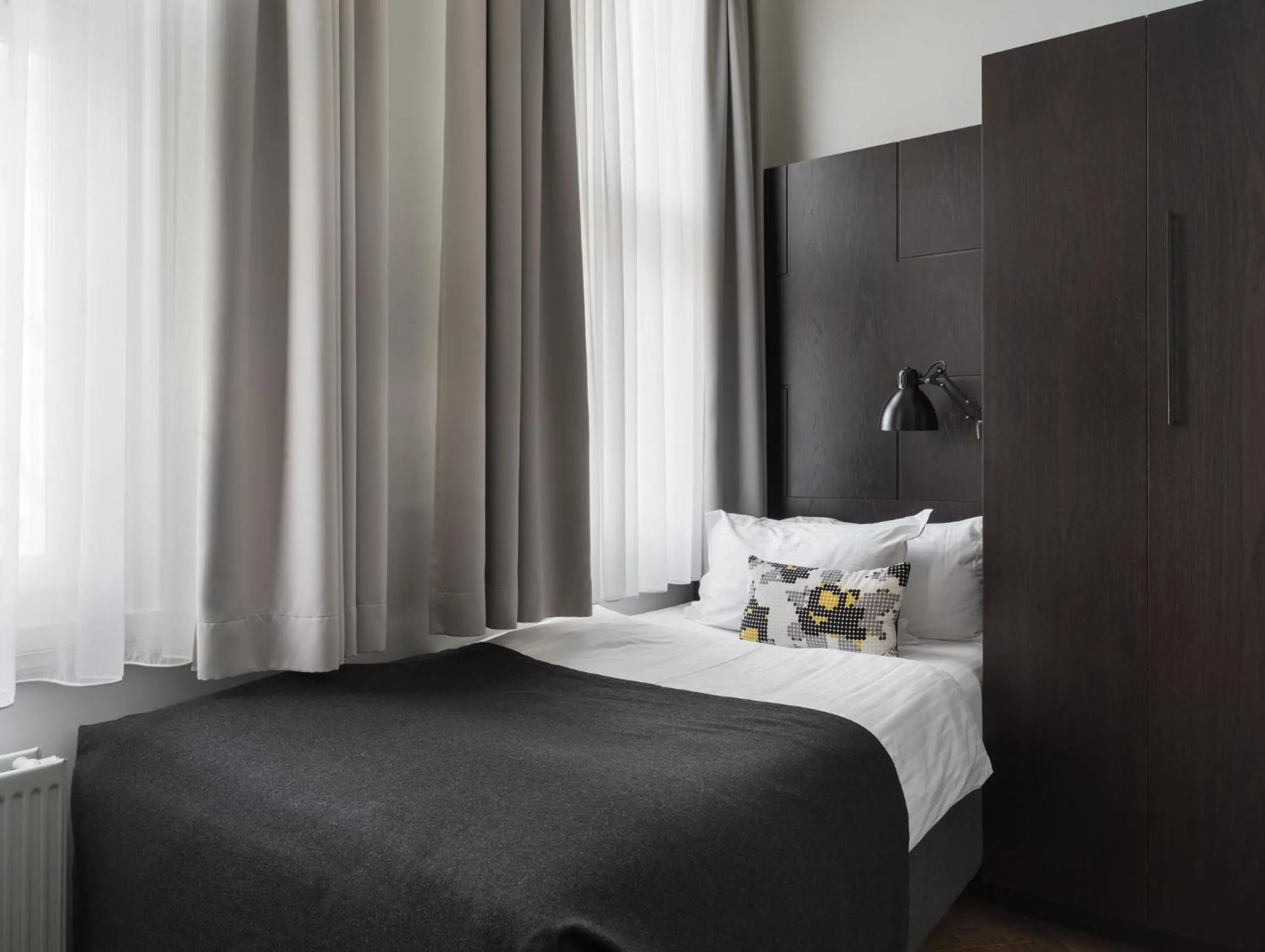 Bedroom, Bed in Apótek Hotel Reykjavík by Keahotels