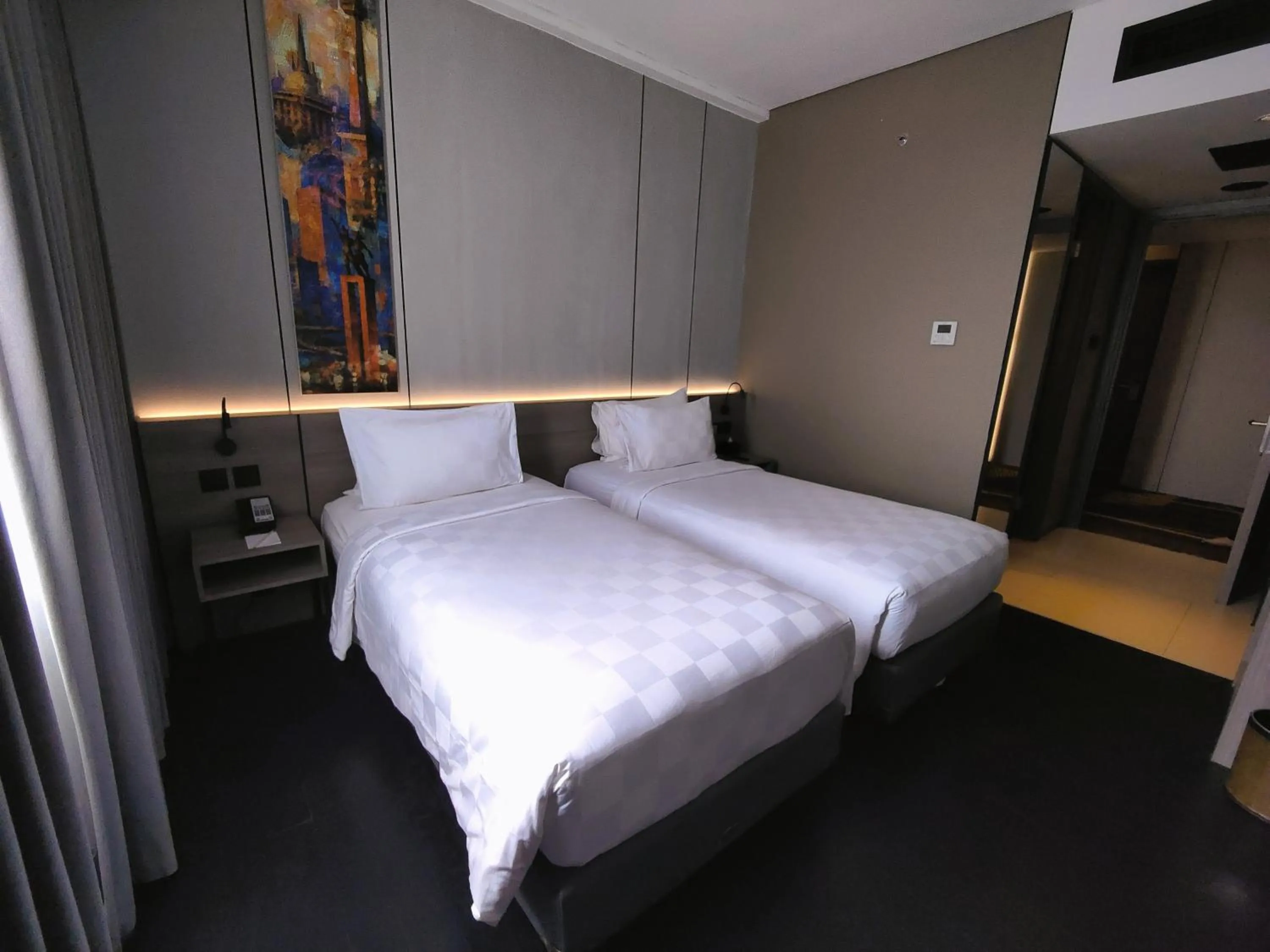 Bed in Citadines Connect Airport Jakarta Hotel