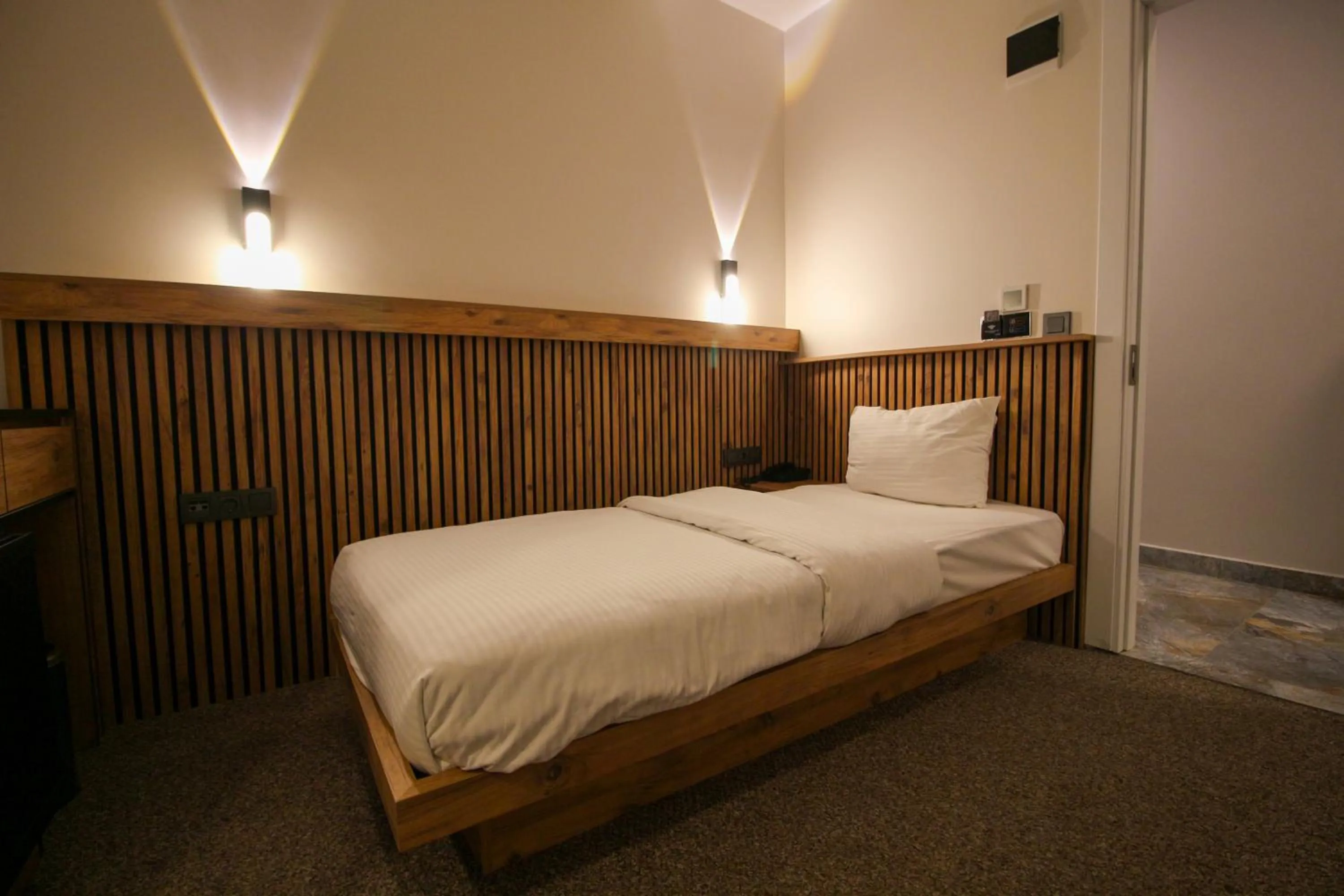 Bed in Kaya Hotel SAW