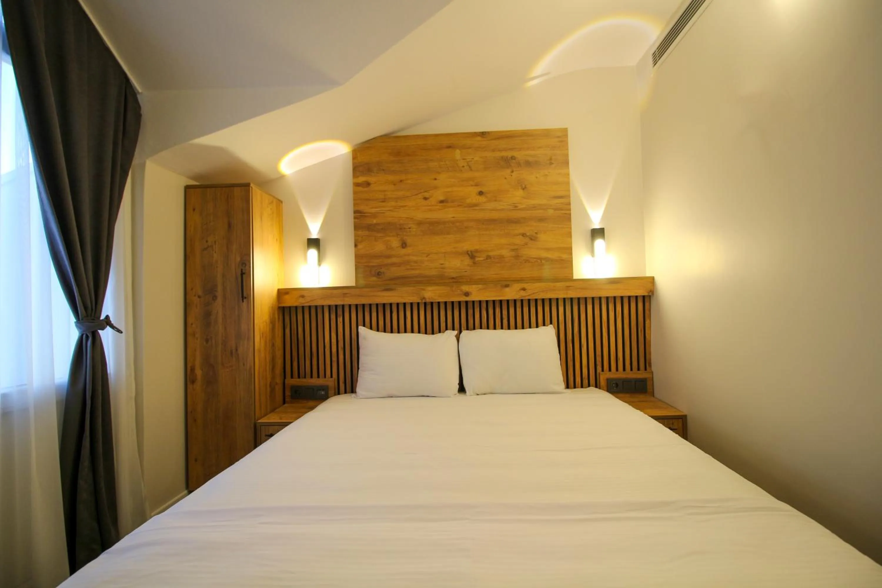 Bed in Kaya Hotel SAW