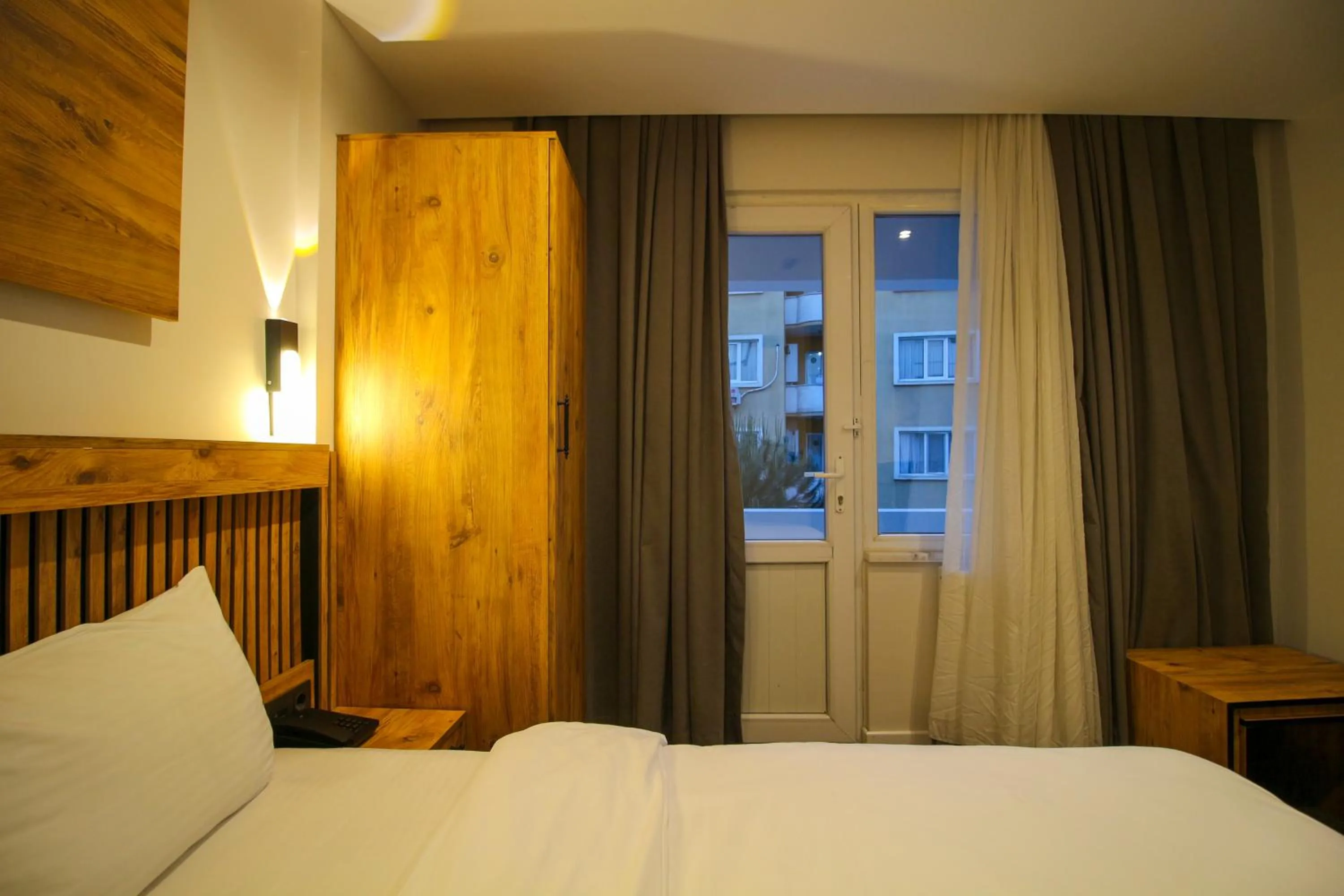 Bed in Kaya Hotel SAW