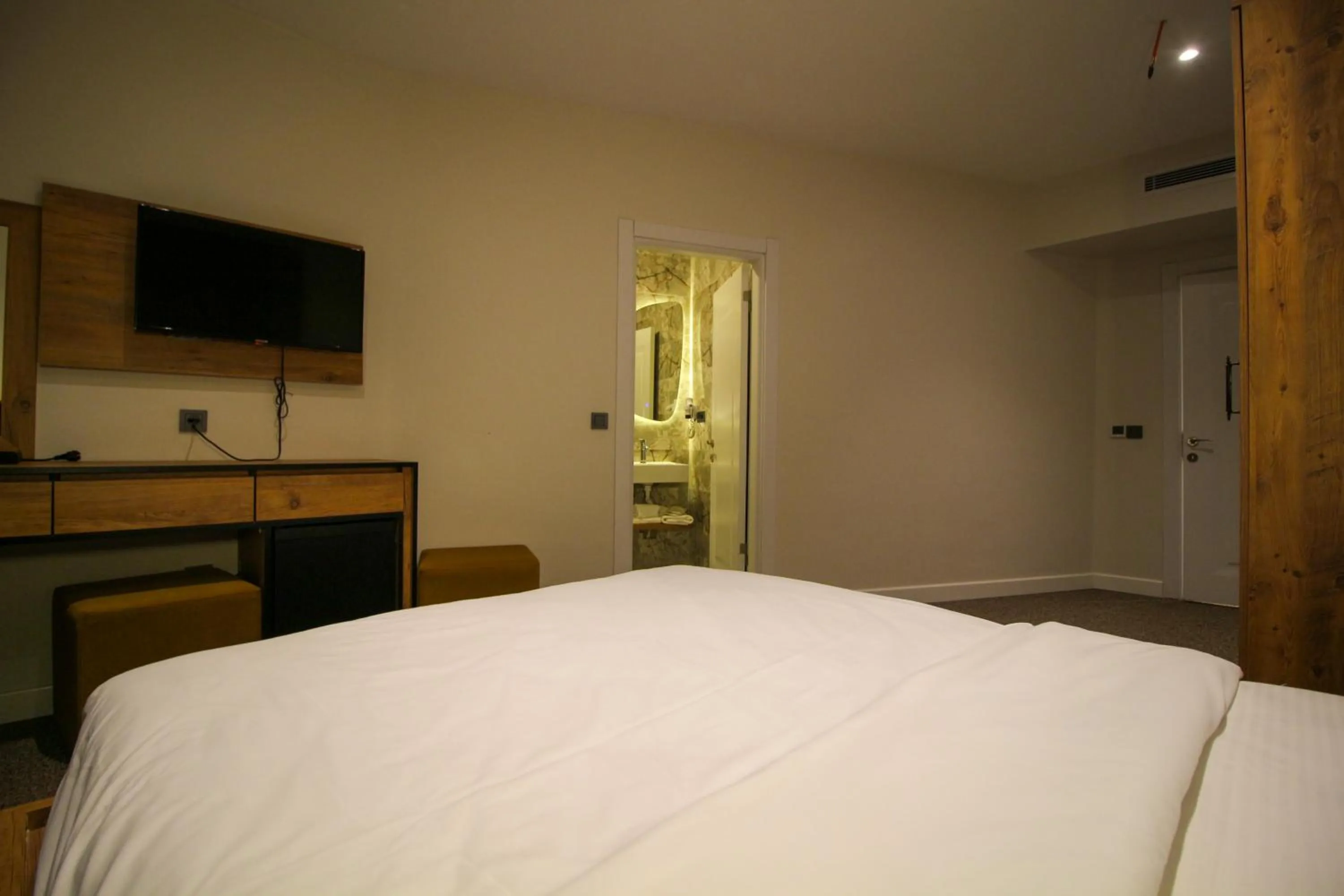 Bed in Kaya Hotel SAW