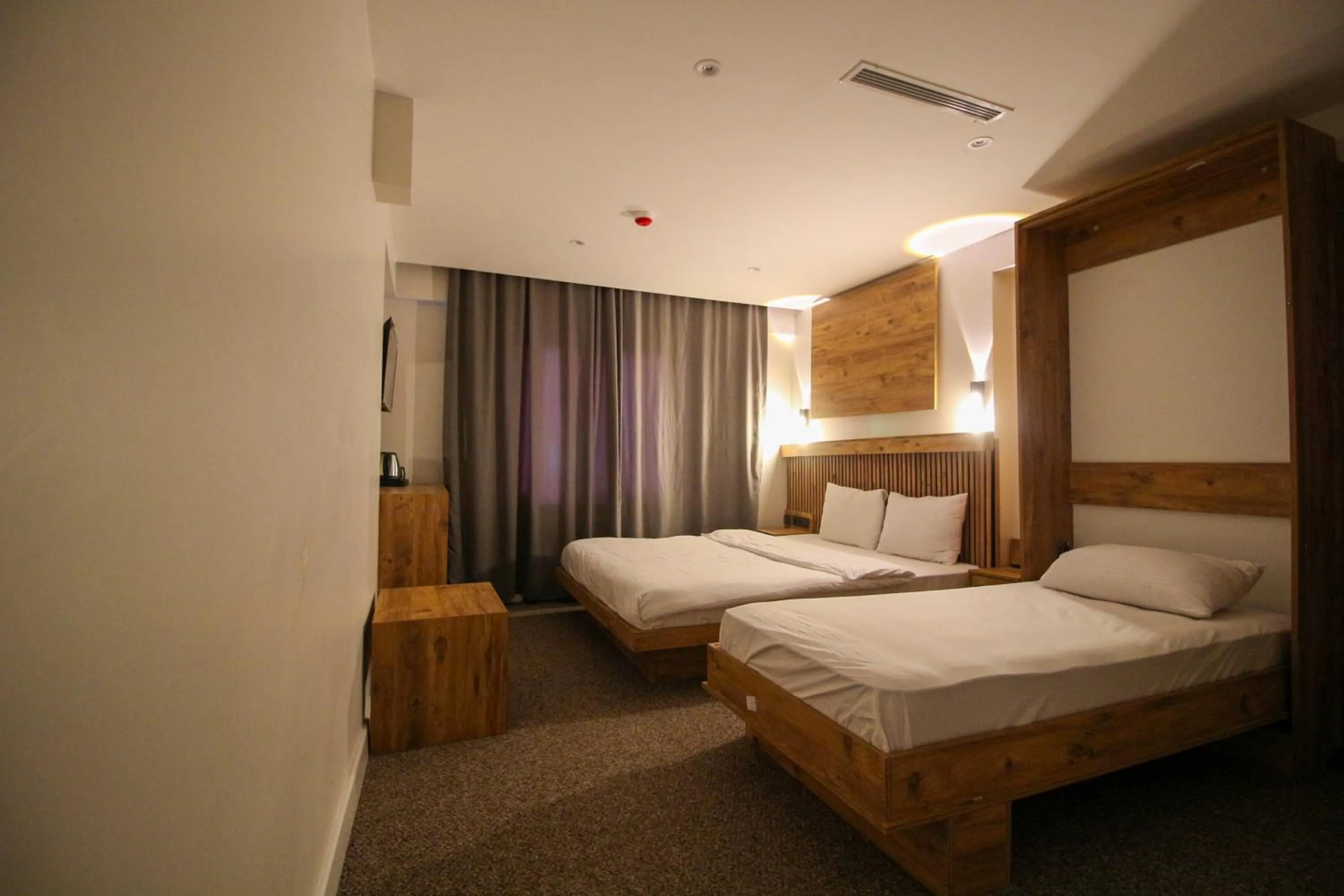 Bed in Kaya Hotel SAW