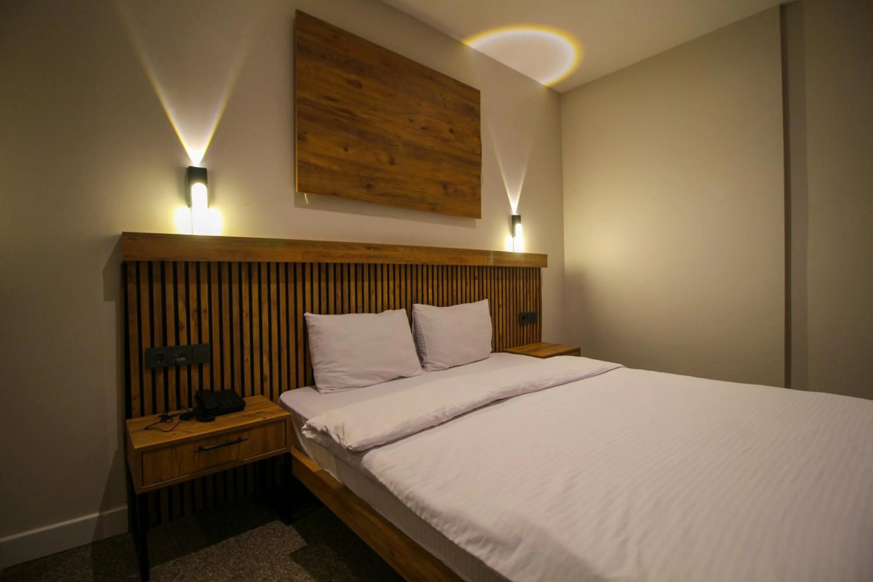 Bed in Kaya Hotel SAW