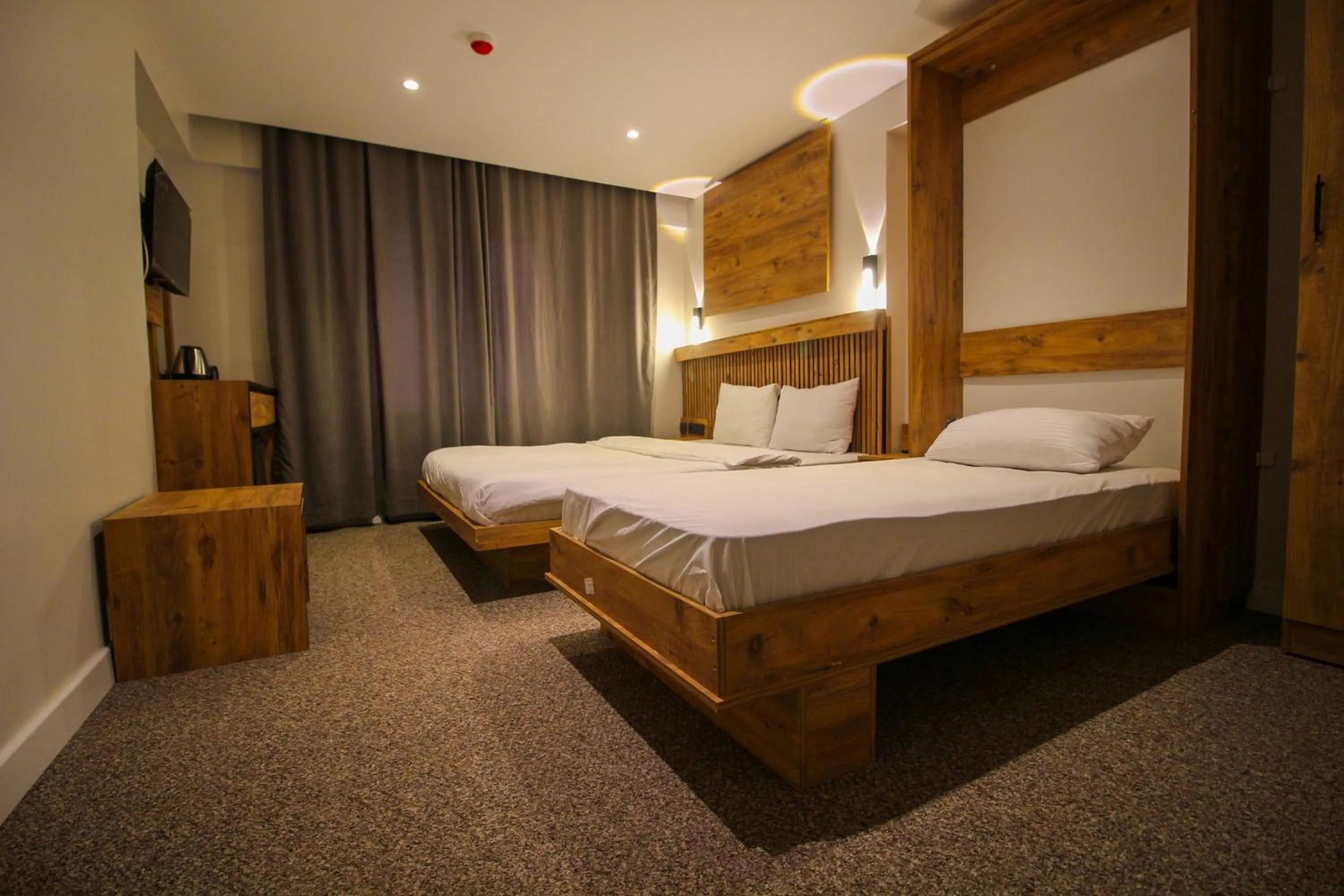 Bed in Kaya Hotel SAW