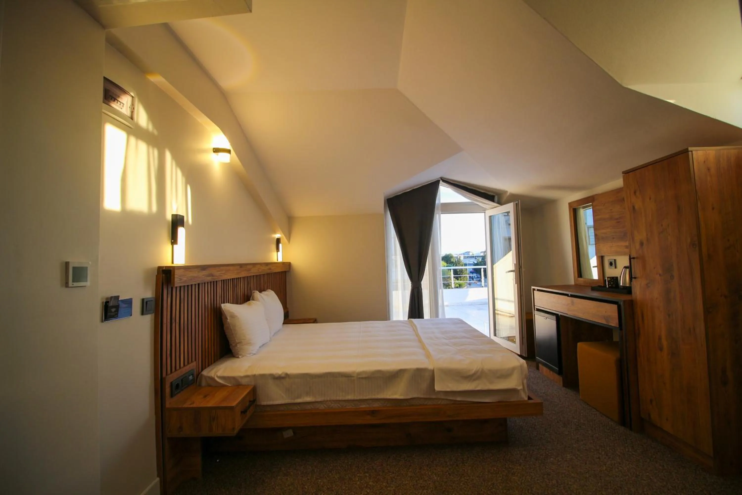 Bed in Kaya Hotel SAW