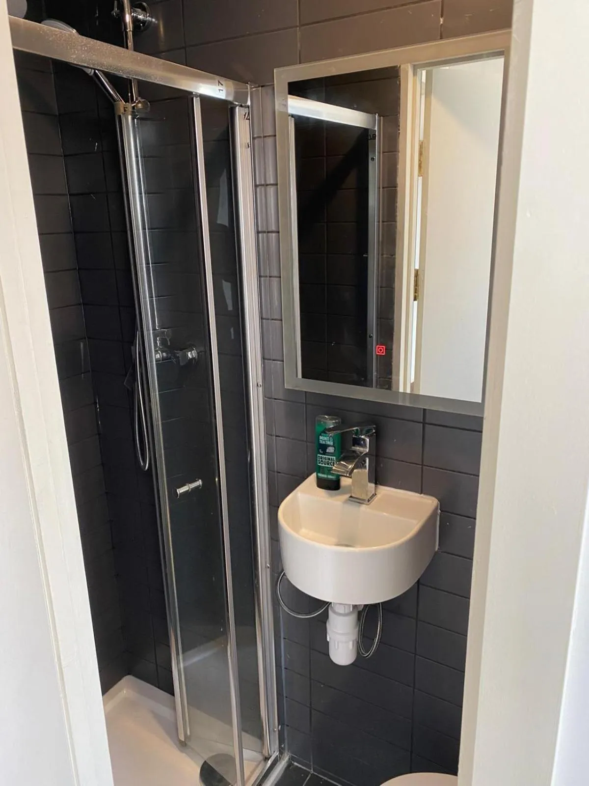 Bathroom in Exhibition Court Hotel 4