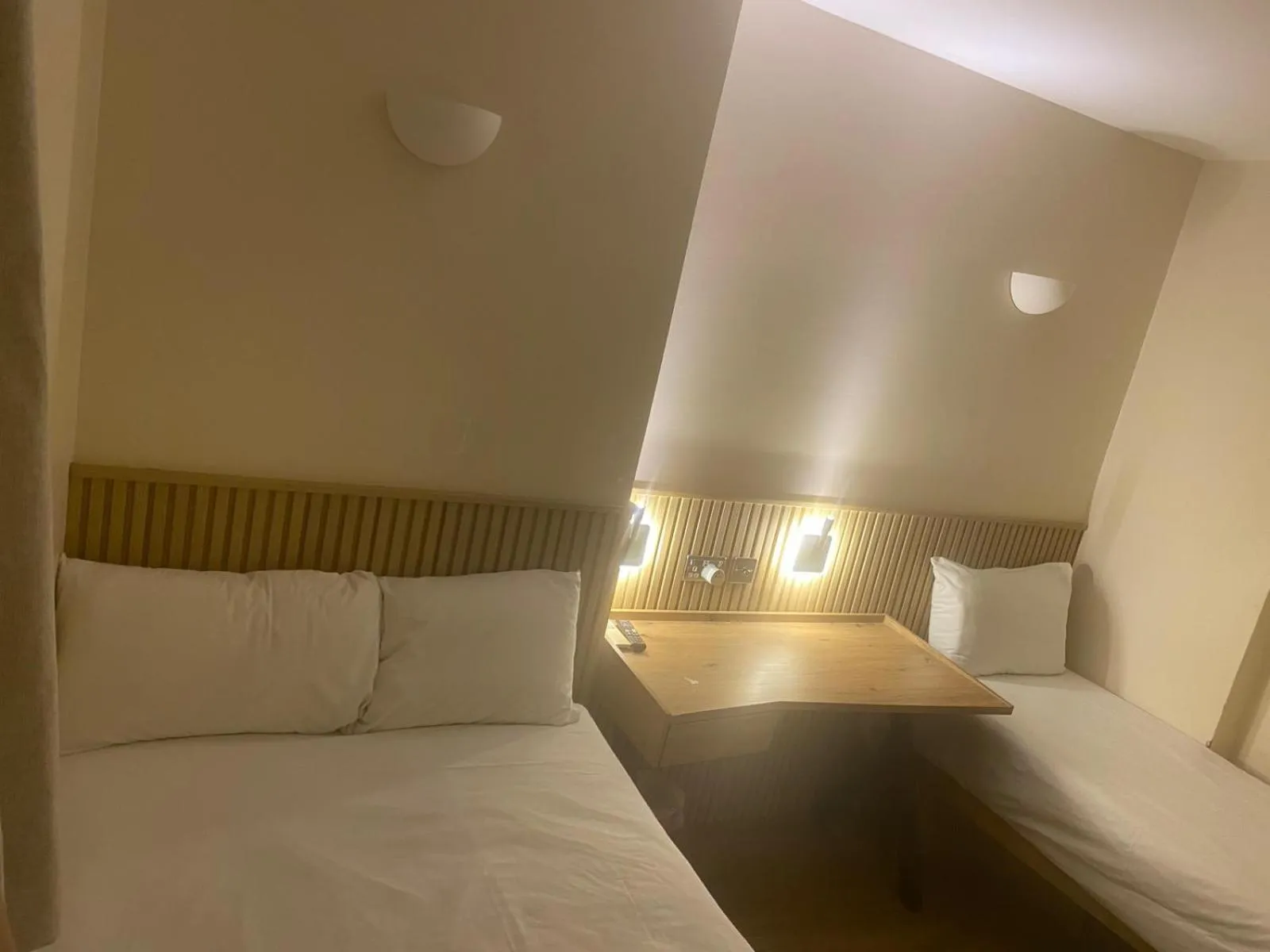 Photo of the whole room, Bed in Exhibition Court Hotel 4