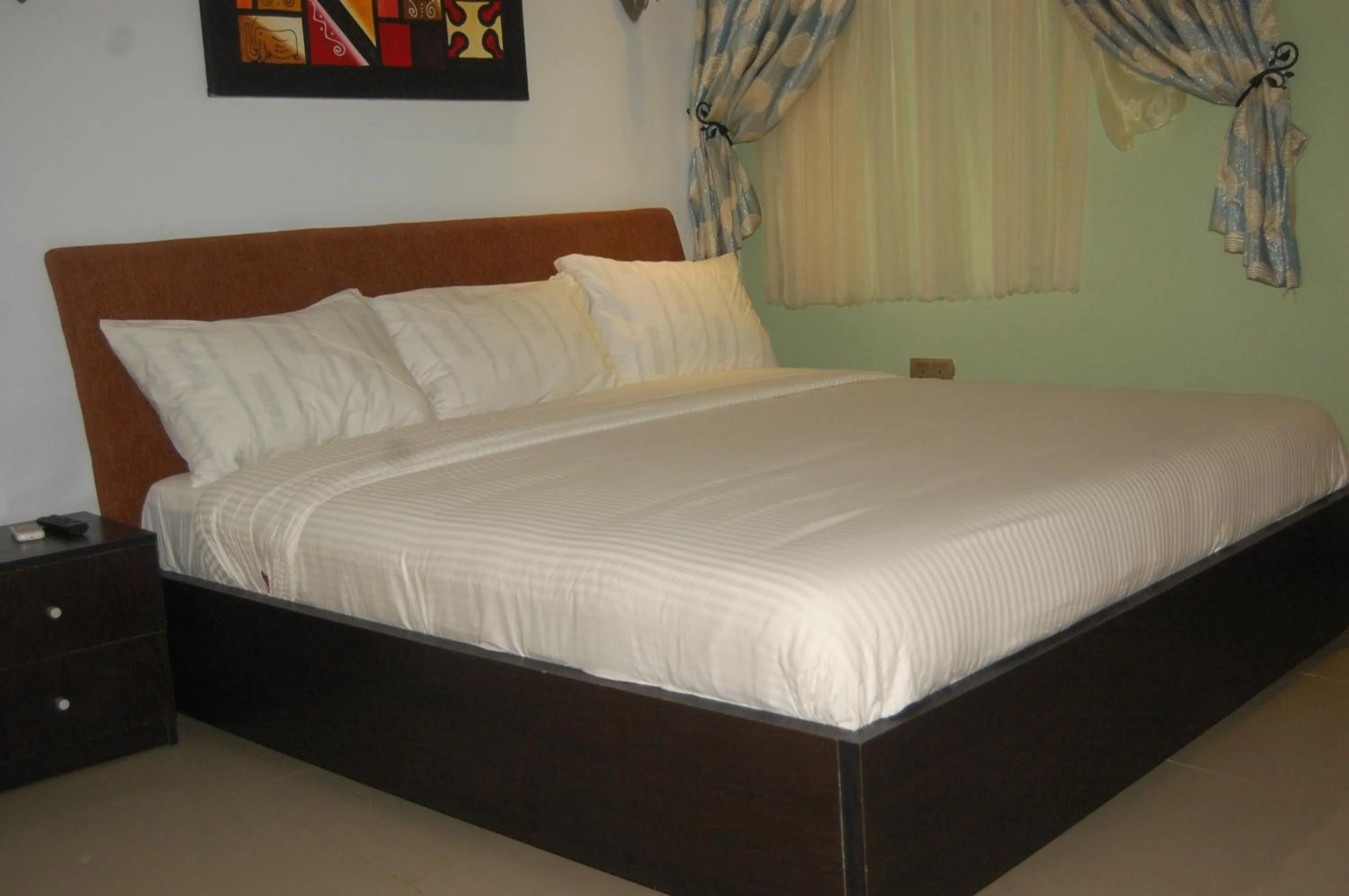 Bed in BEN AUTO Hotel