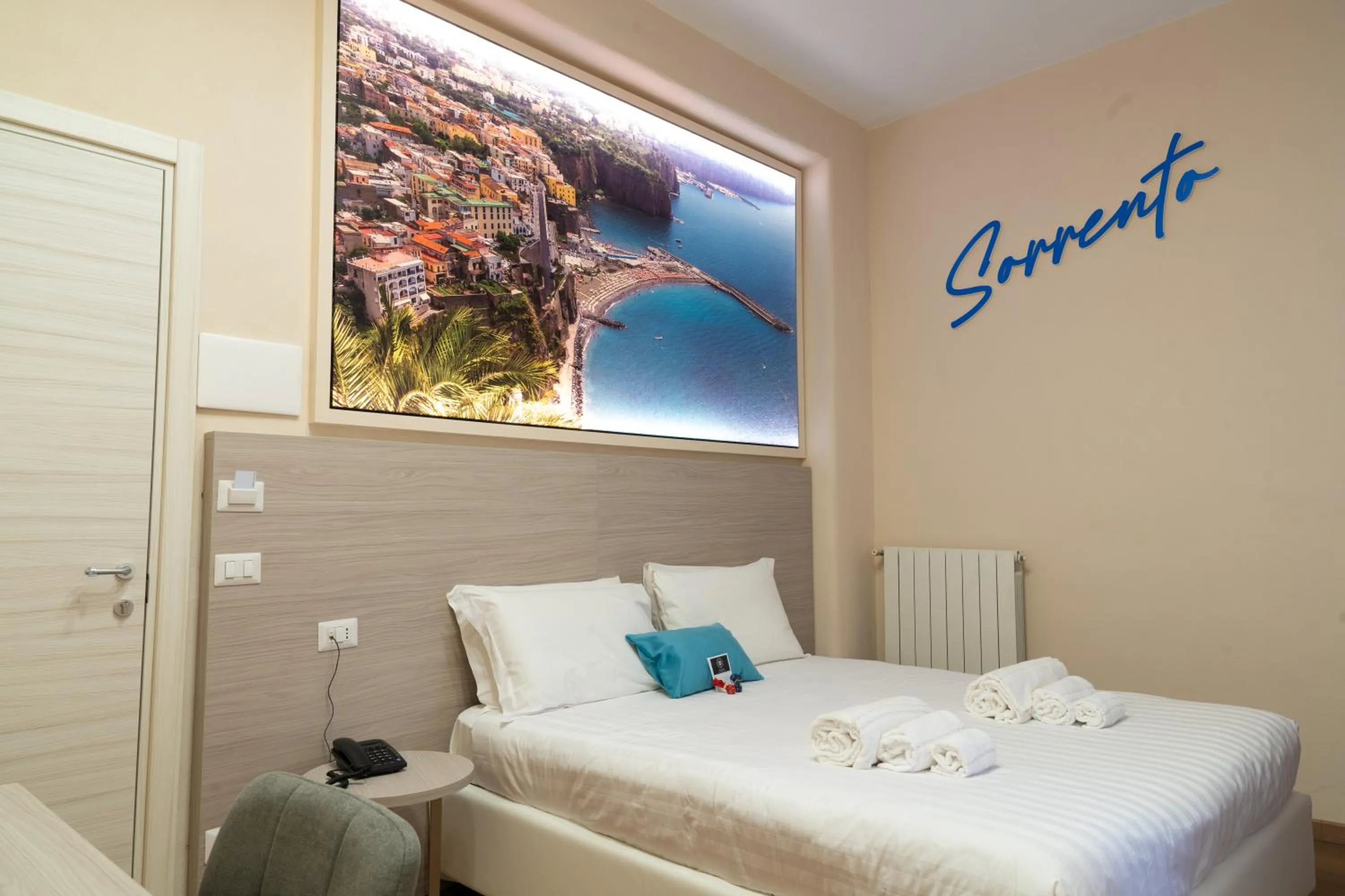 Bed in THE SUN HOTEL BOUTIQUE NAPOLI