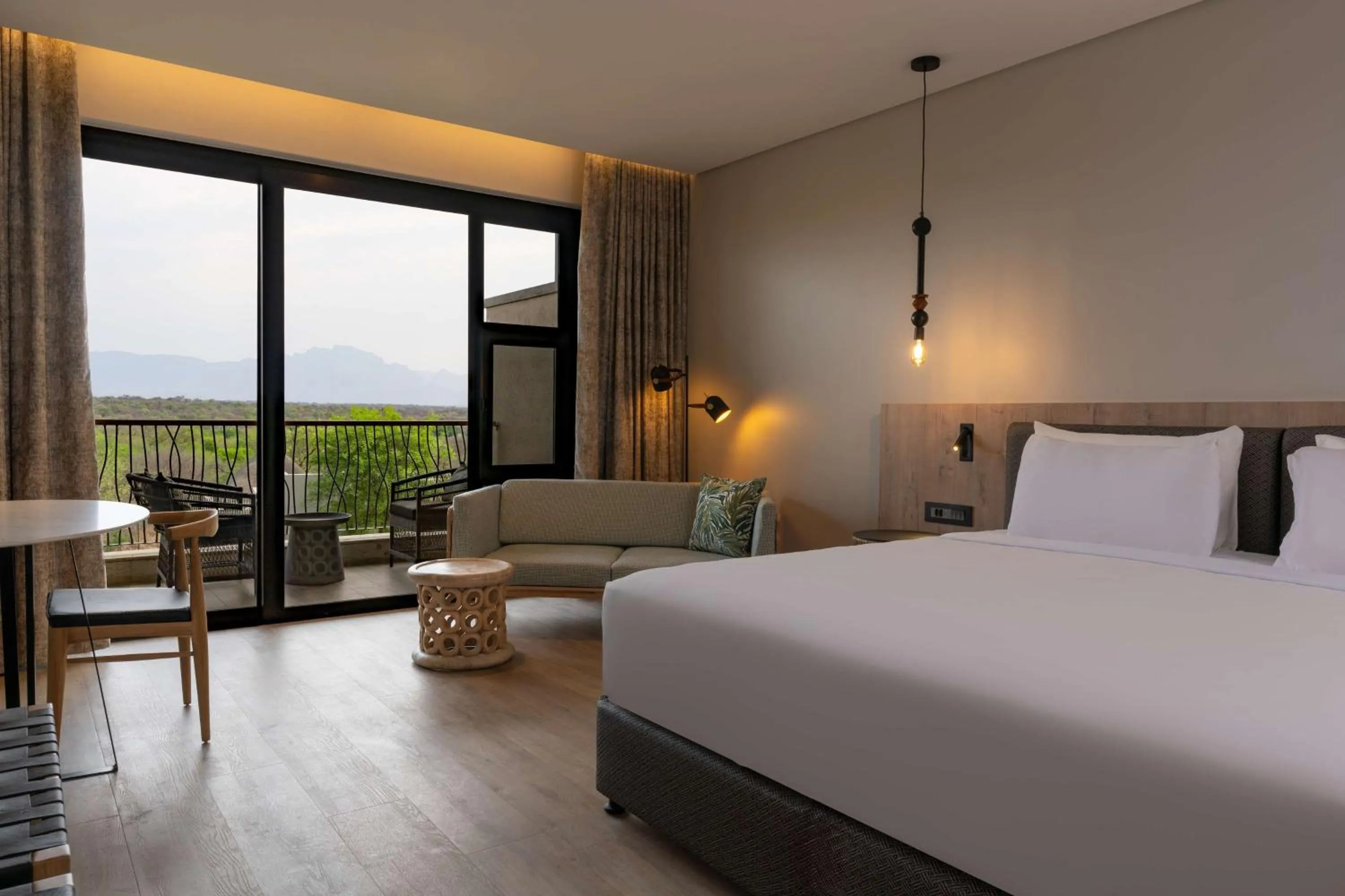 Bedroom, Bed in Radisson Safari Hotel Hoedspruit