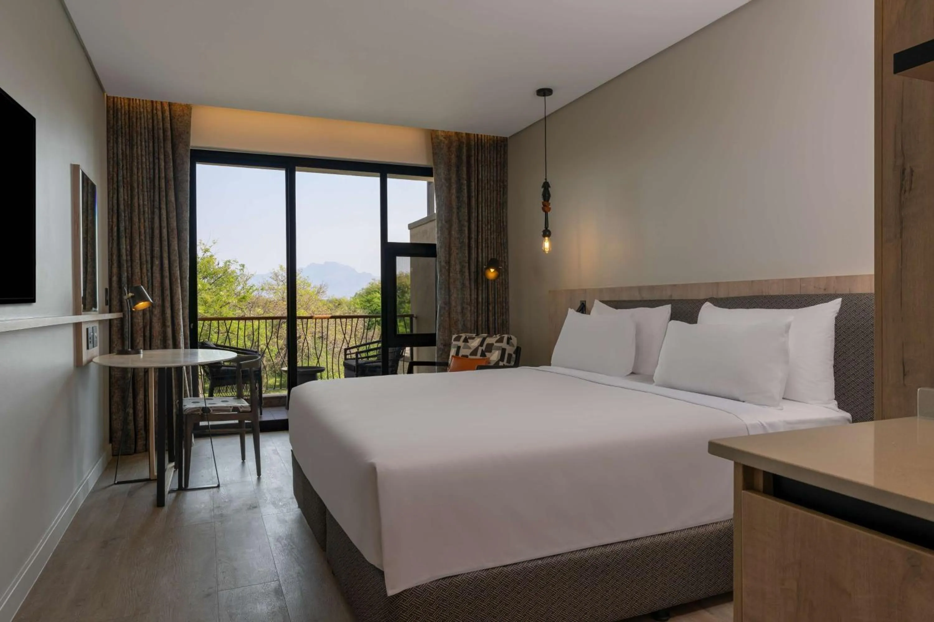 Bedroom, Bed in Radisson Safari Hotel Hoedspruit