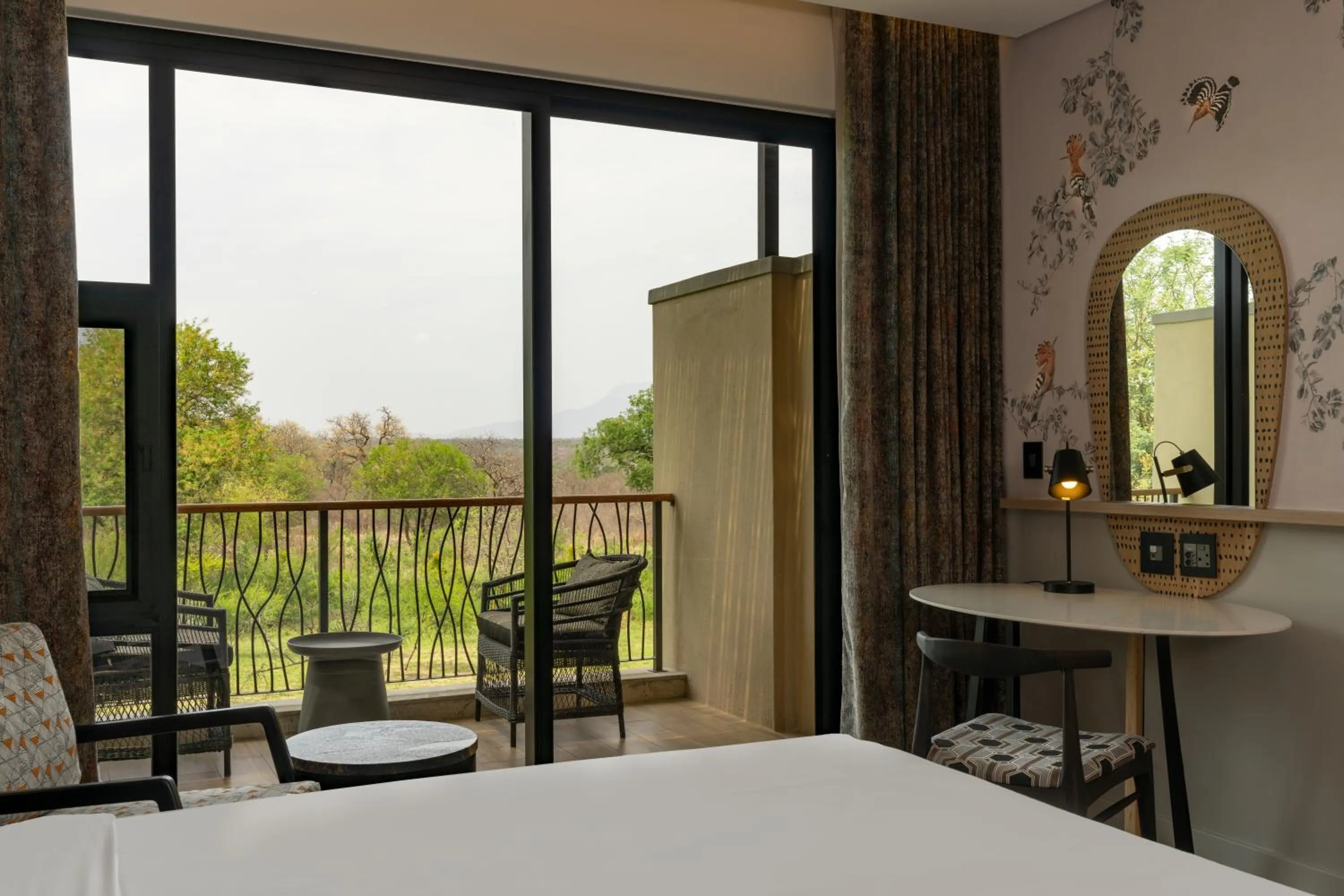 Balcony/Terrace, Bed in Radisson Safari Hotel Hoedspruit