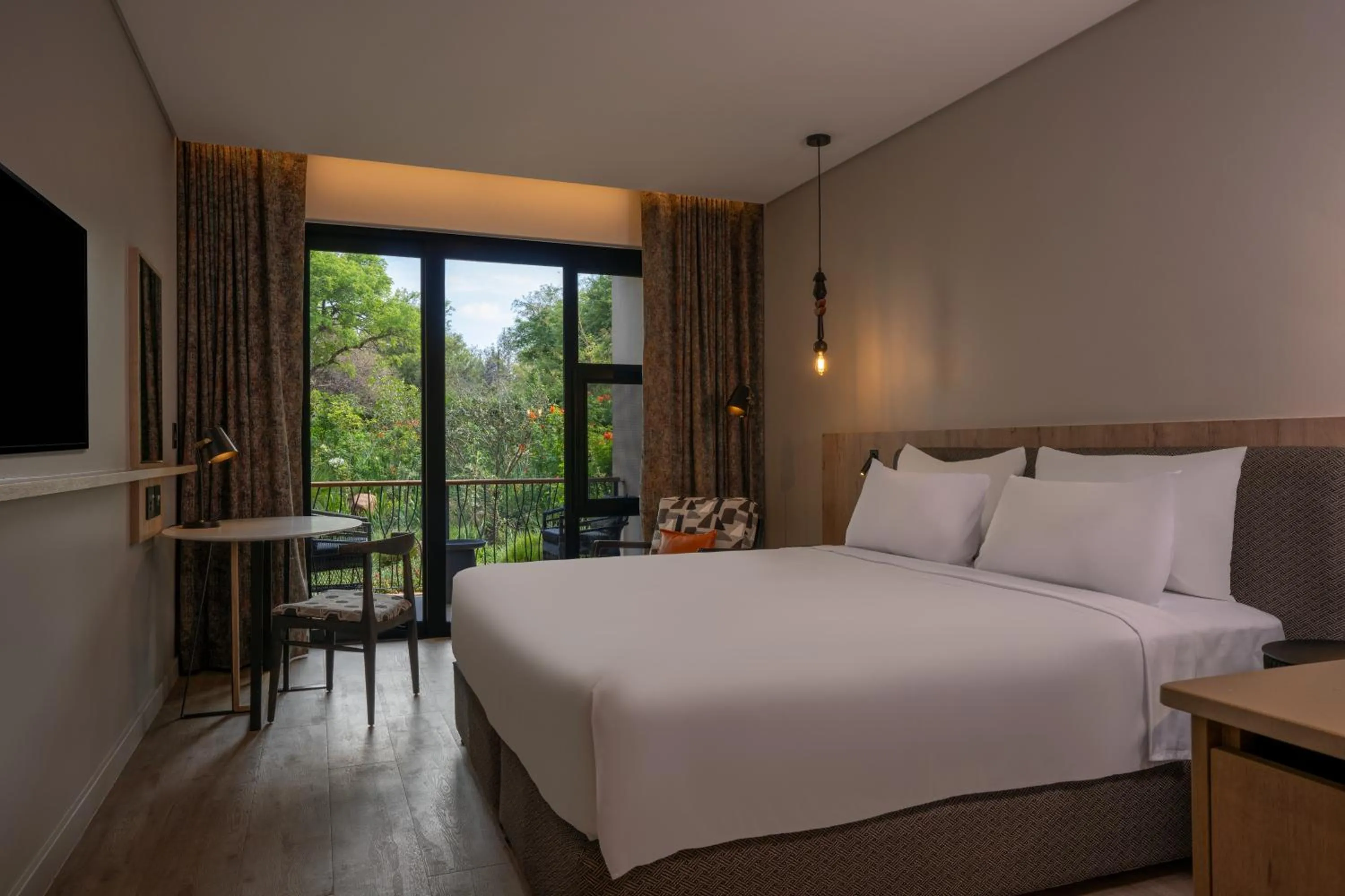 Bedroom, Bed in Radisson Safari Hotel Hoedspruit